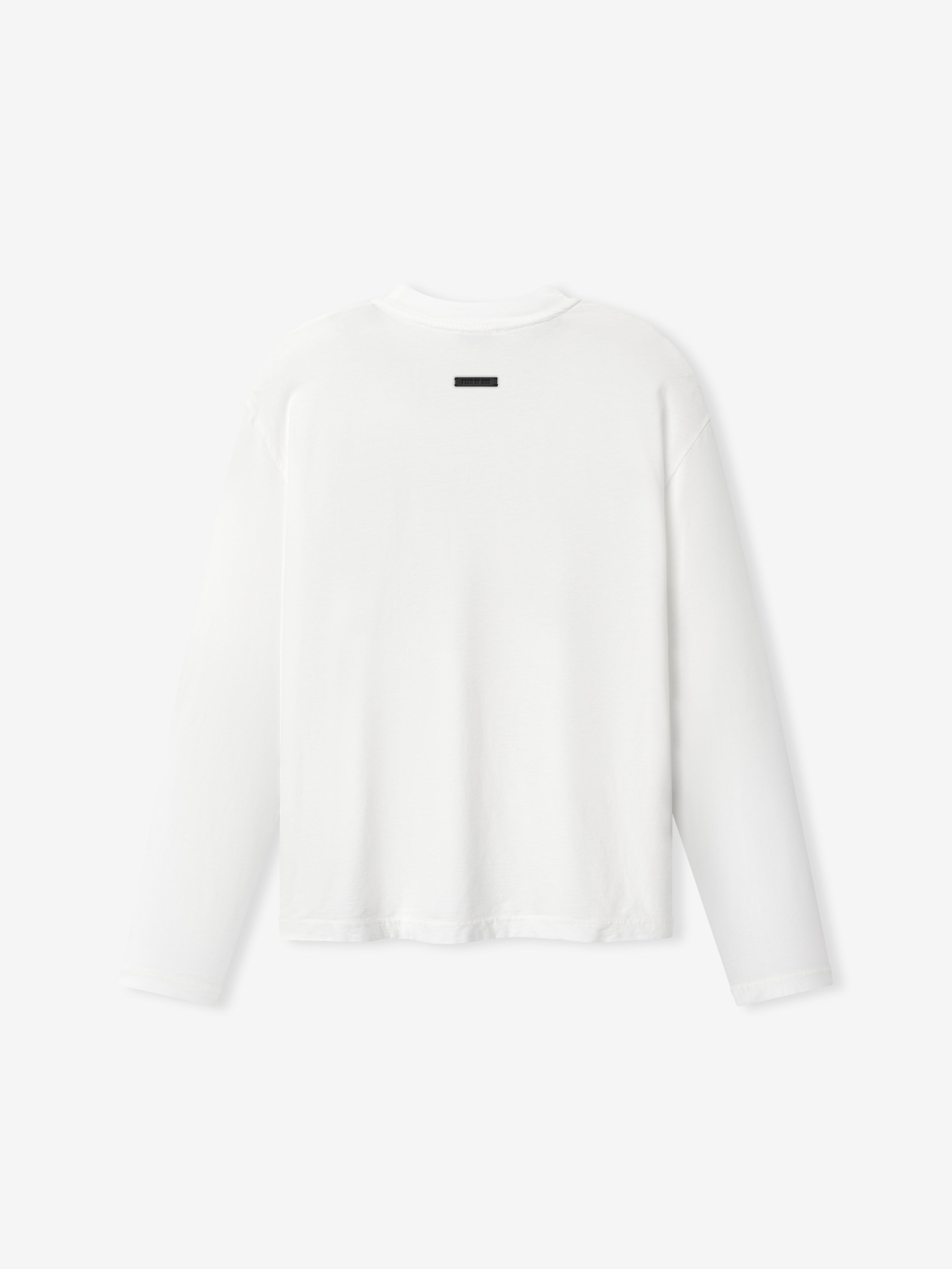 Back view of plain white long-sleeve shirt with small black rectangular detail near the neckline
