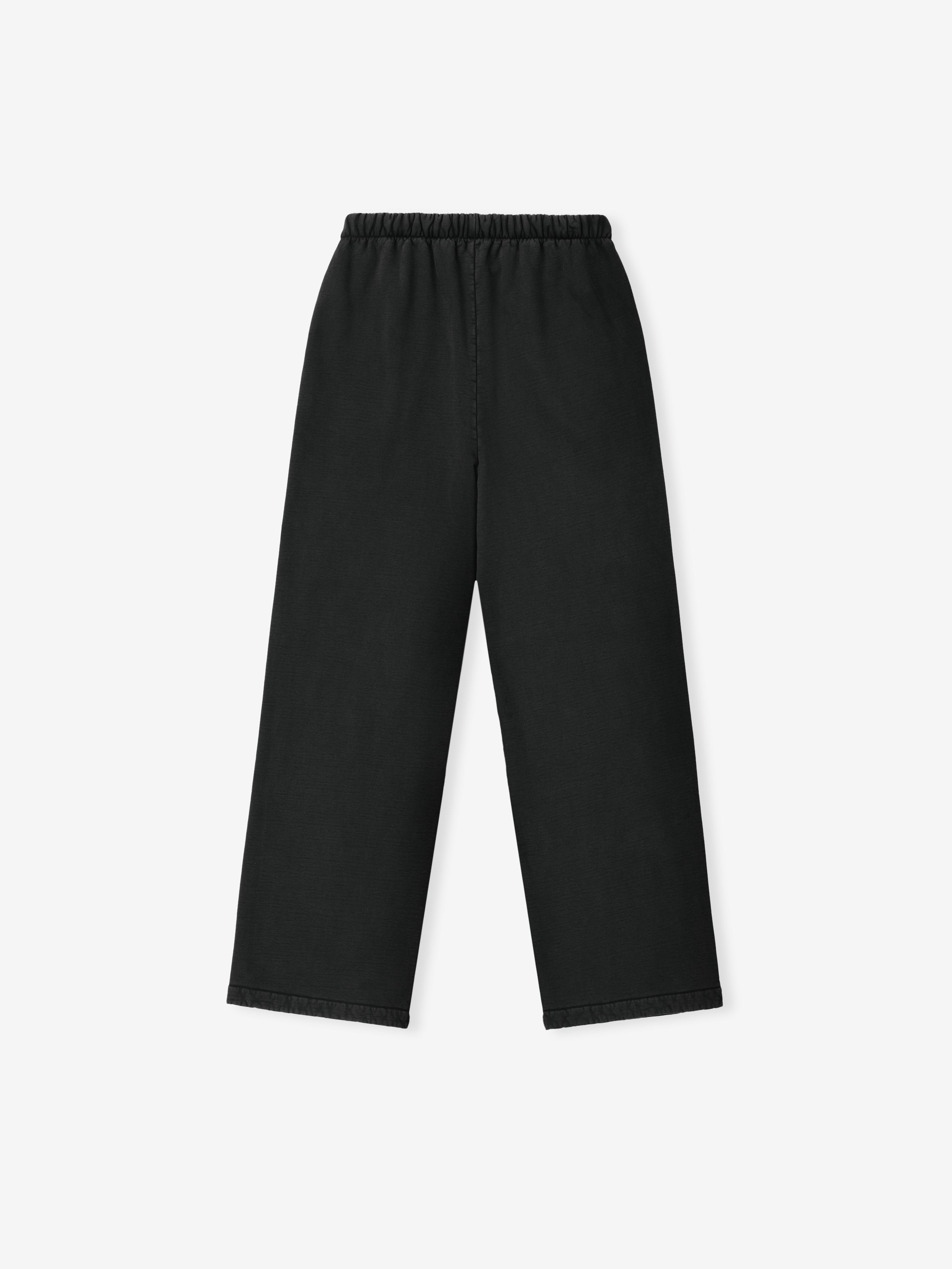 Back view of black straight-leg pants with gathered elastic waistband on plain white background