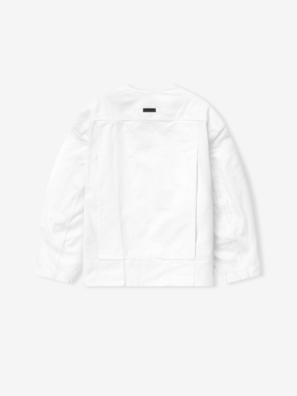 back view of optic white cotton broken twill relaxed lapelless denim jacket with deep pleats and snap buttons
