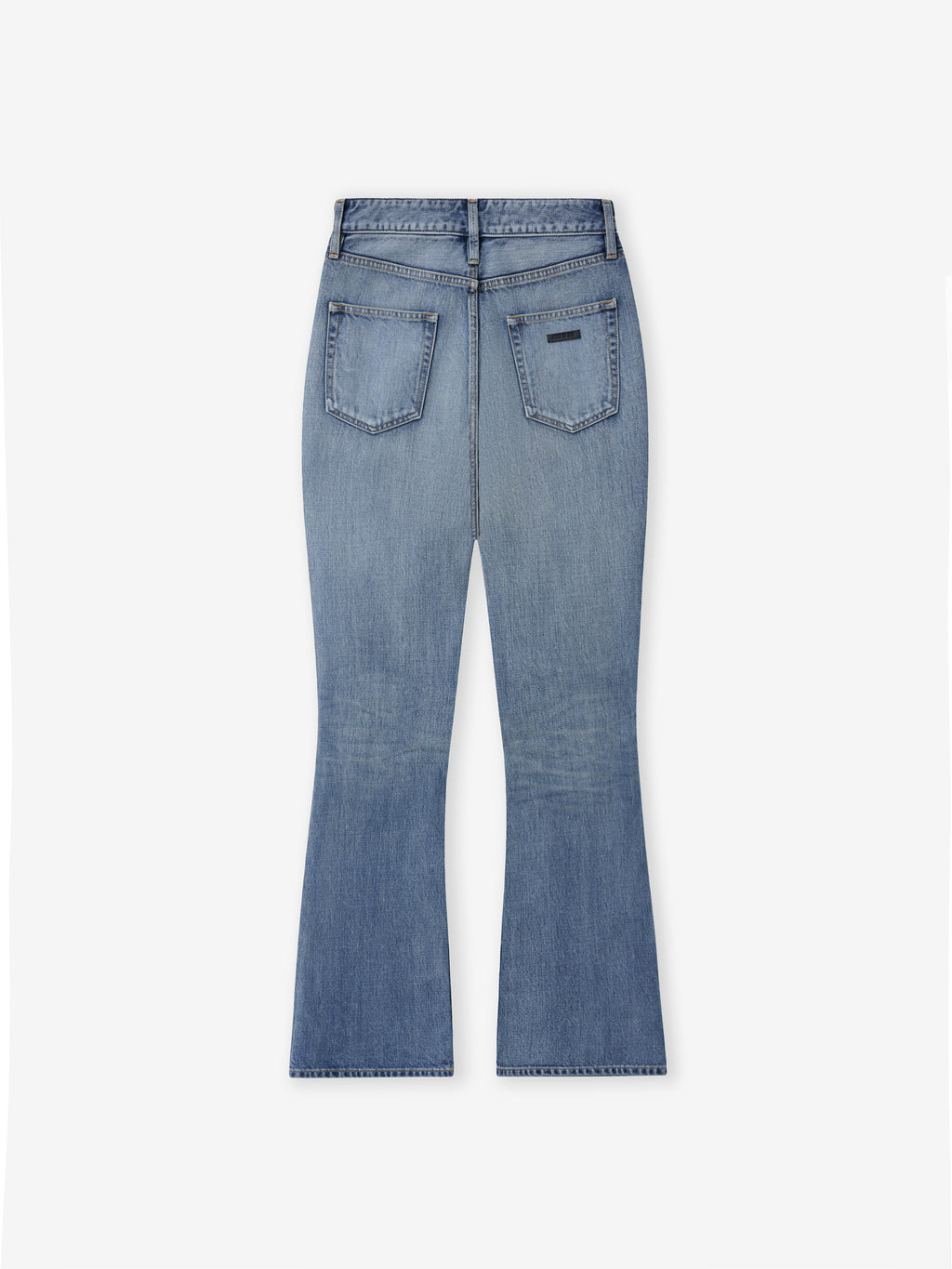 back view of classic blue indigo 100% cotton denim jeans with relaxed fit flared legs and rear patch pockets