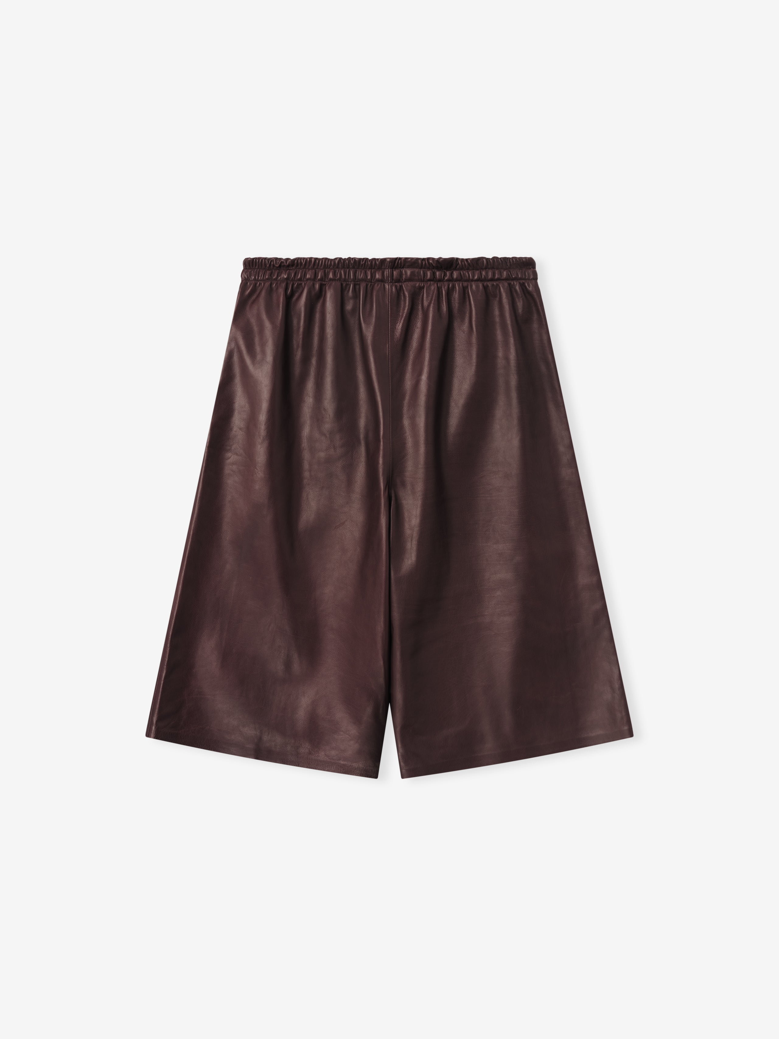 baggy knee-length women's shorts in dark full-grain calfskin leather with elastic waistband and drawstring closure
