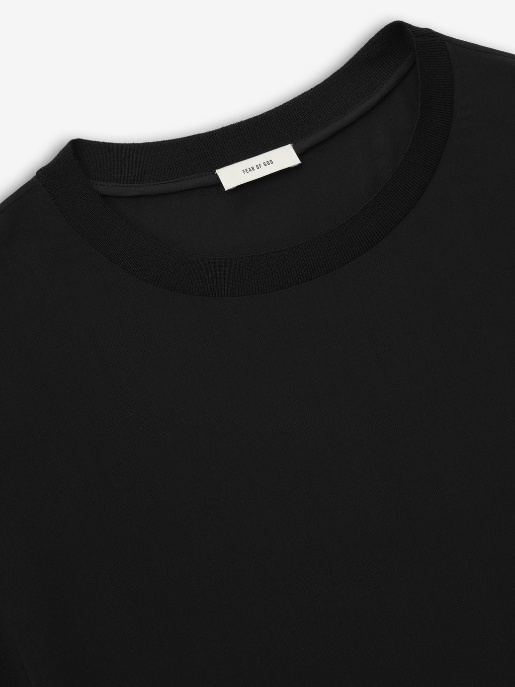 close-up of black sleeveless women's tee with rib-knit collar made from sheer wool viscose fabric