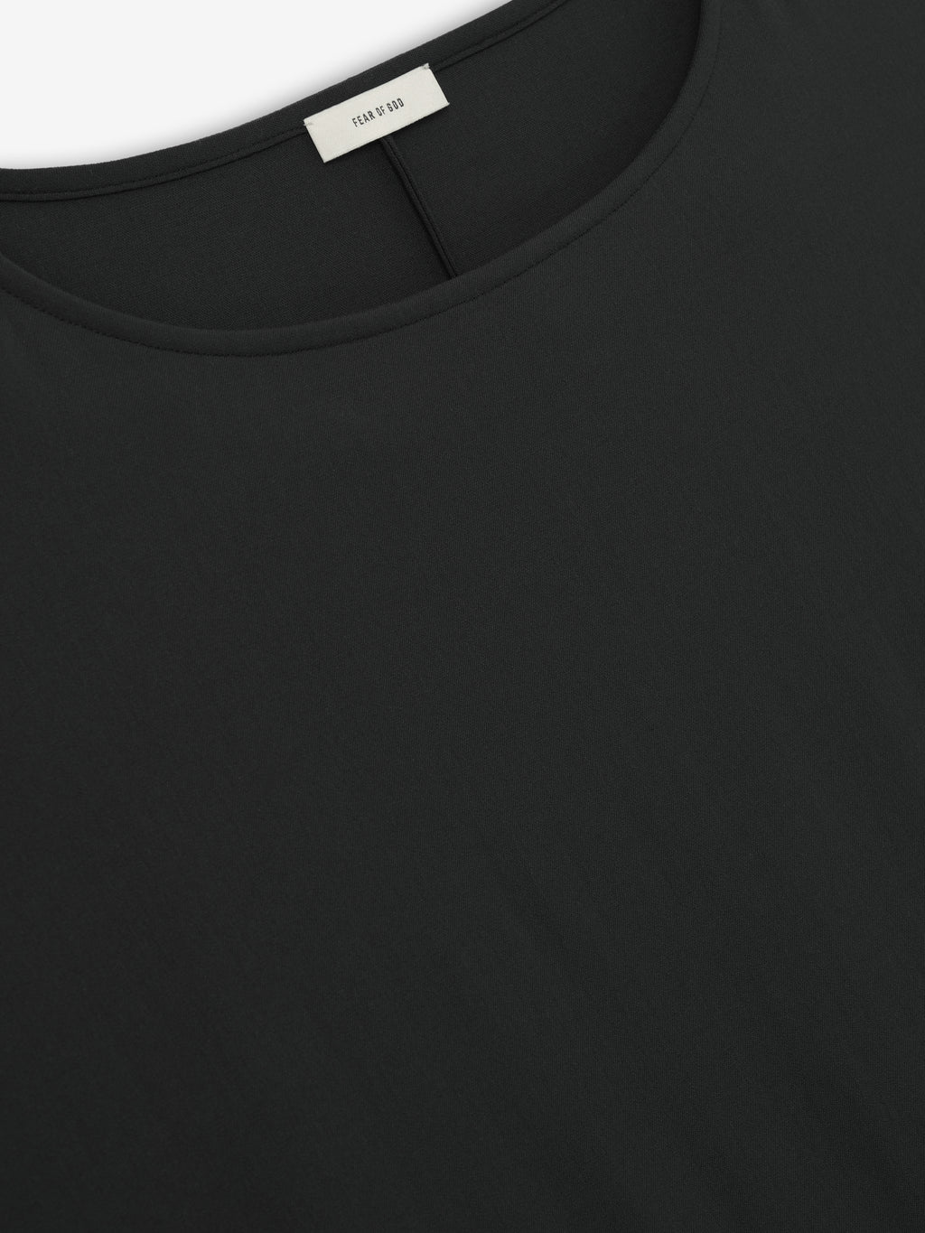 close-up of black superfine wool tee with boat neckline and visible back center seam detail