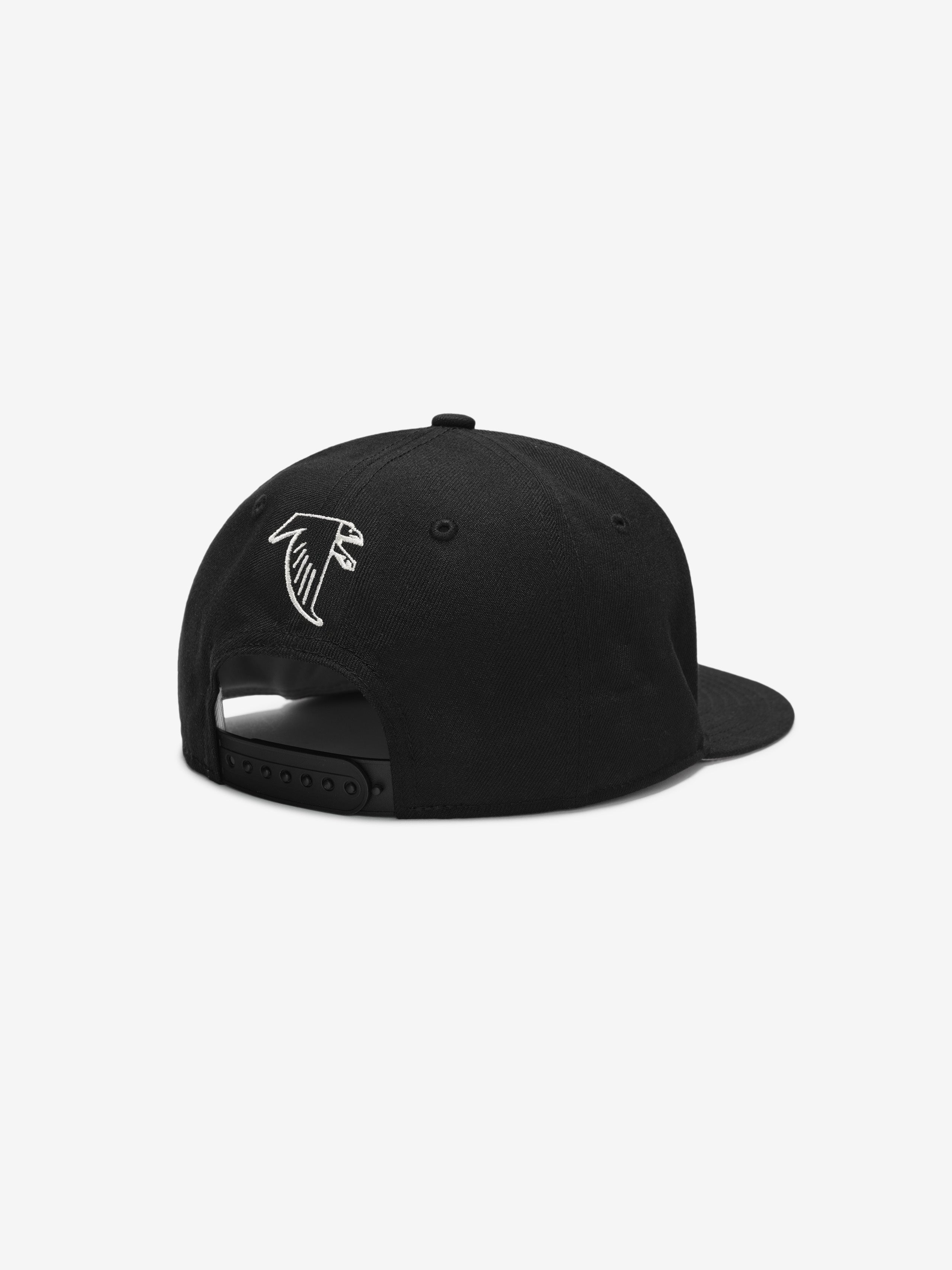 Rear angled view of black Falcons 9Fifty RC Snapback featuring white team logo and adjustable snapback closure, gallery image 0