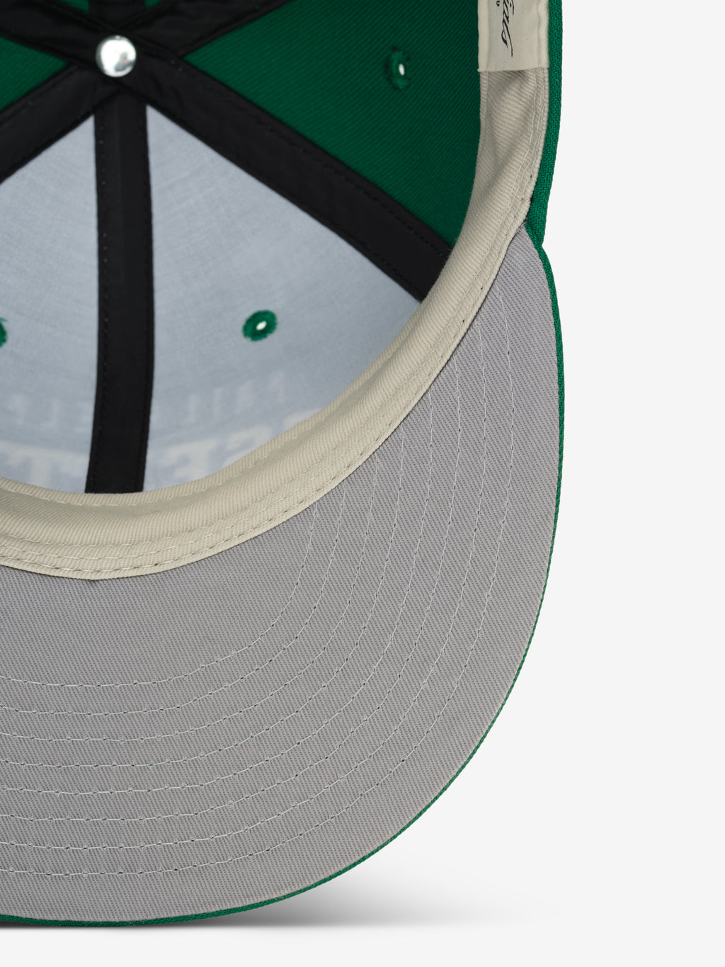Underbill view of Eagles 9Fifty RC Snapback showing gray brim and cream inner sweatband, gallery image 0 FOG_950RC_31974.jpg