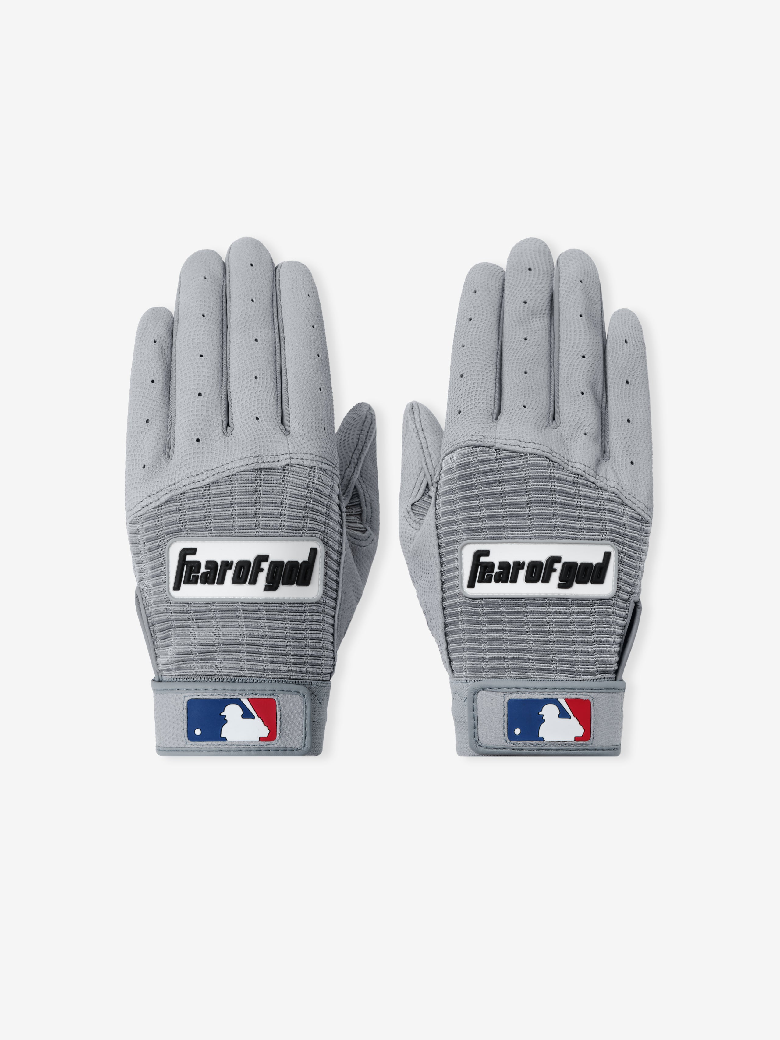 Franklin Pro Classic Seal Grey gloves featuring perforated breathable fabric with textured palms, bold Fear of God logo on the back and MLB emblem on the wrist straps.