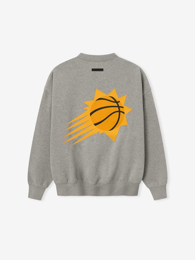 Back view of grey crewneck featuring large orange basketball sunburst graphic and ribbed cuffs and waistband