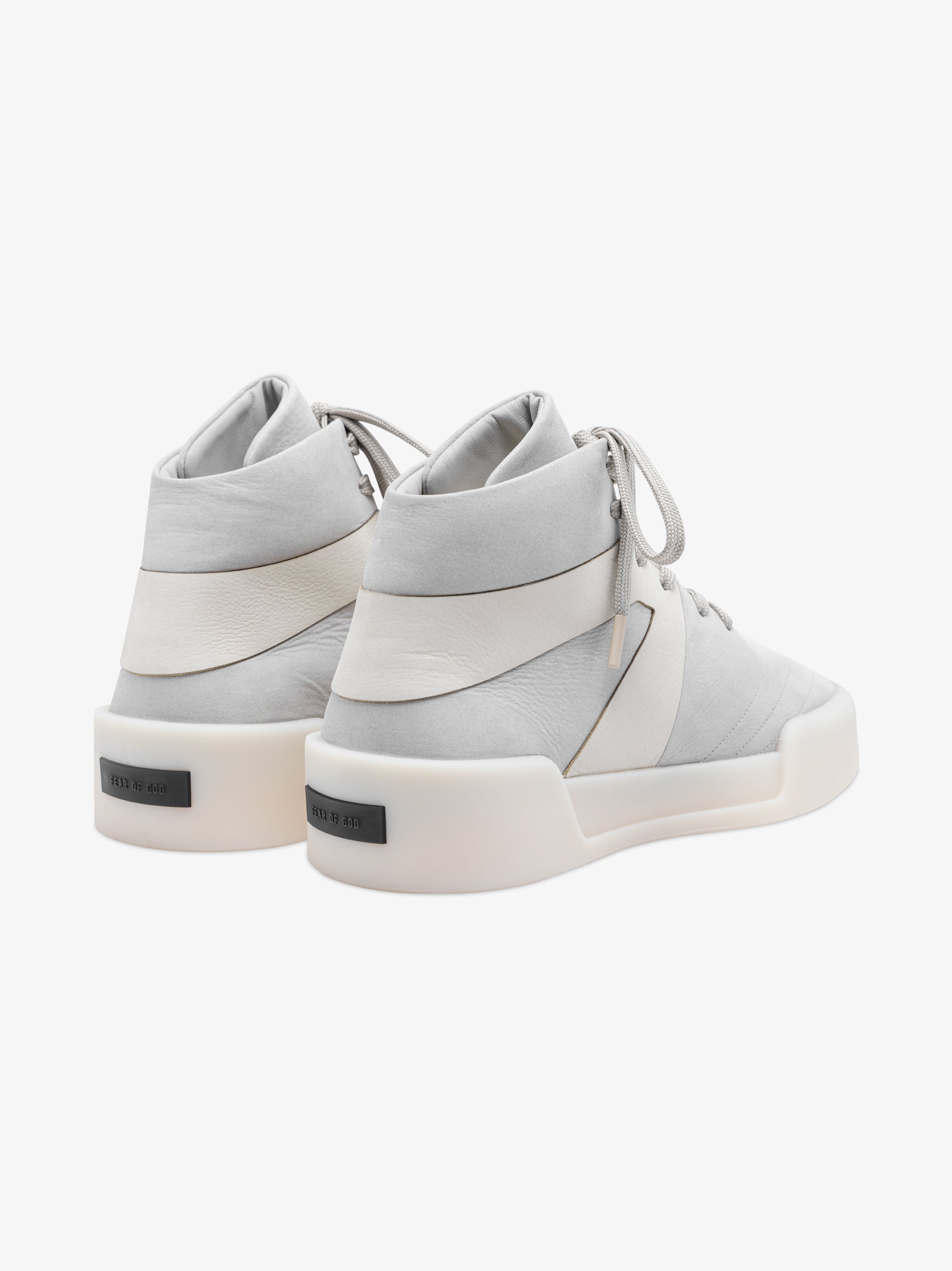 pair of light grey high-top basketball sneakers with smooth Italian leather and thick off-white rubber sole details