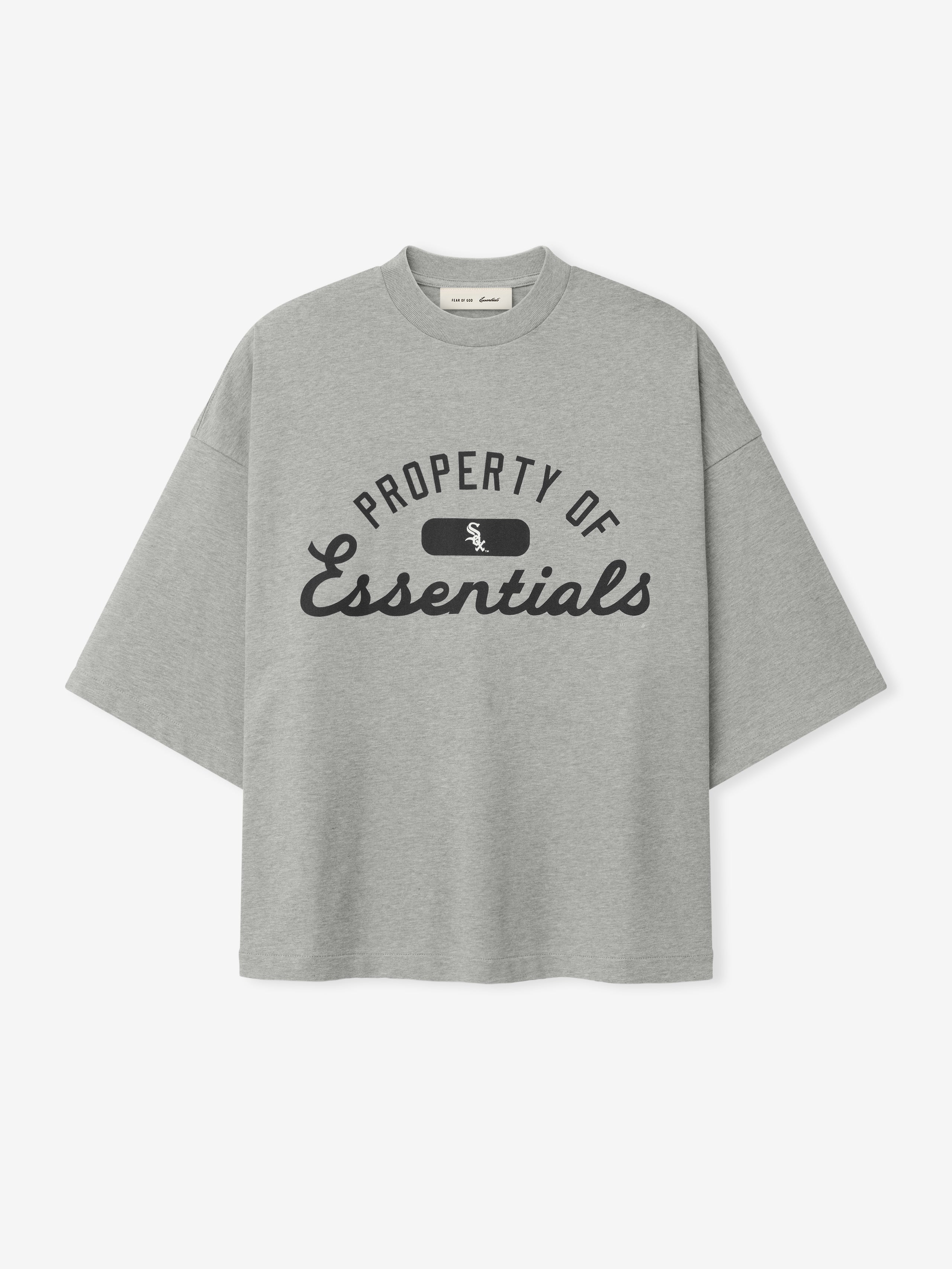 White Sox Merch Tee in concrete heather gray with a relaxed fit, featuring black "Property of Essentials" text and a small team logo on the chest in a casual tee style.
