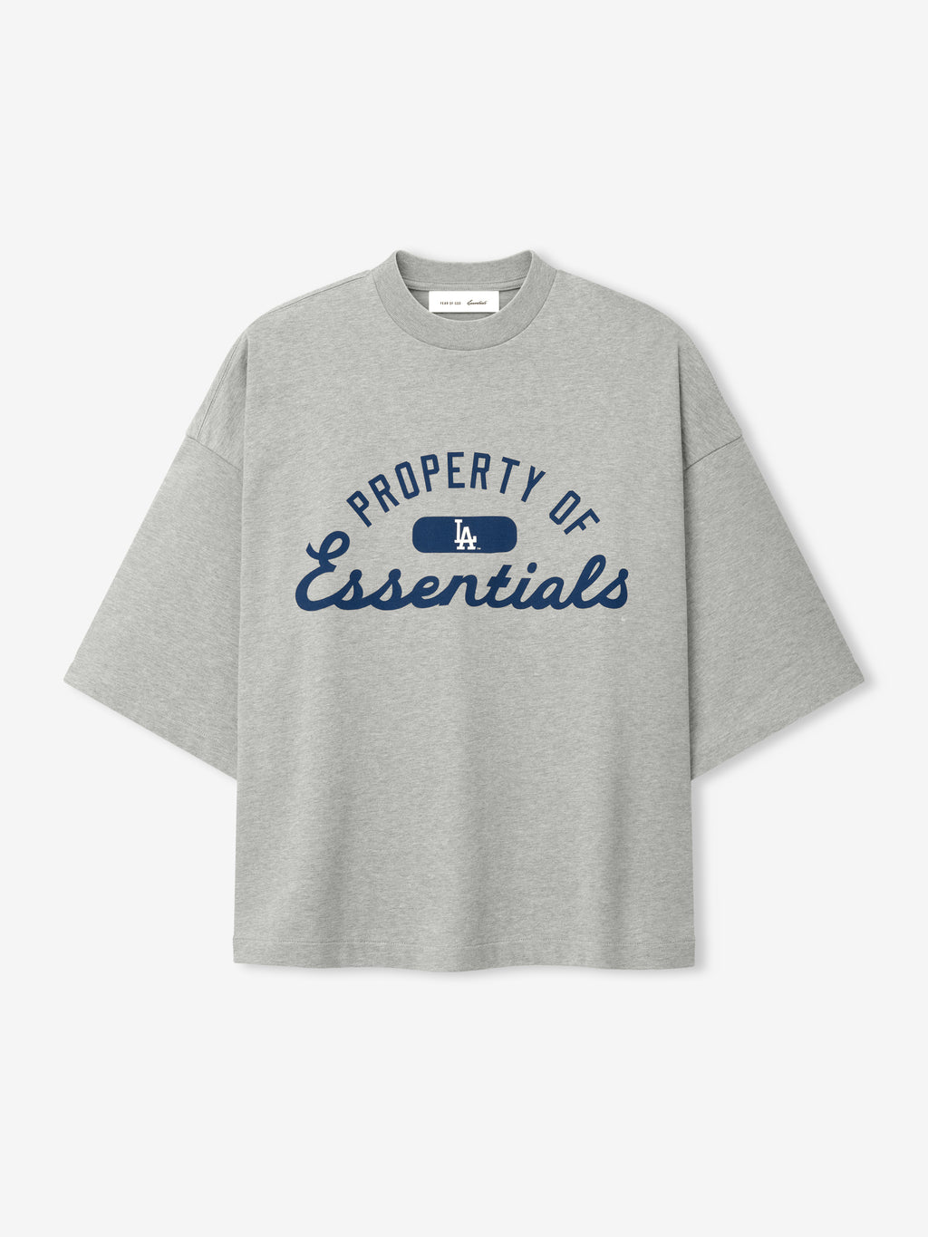Dodgers Merch Tee in light gray heather fabric featuring navy blue "Property of Essentials" text with a small LA logo, styled as a relaxed fit short-sleeve top.