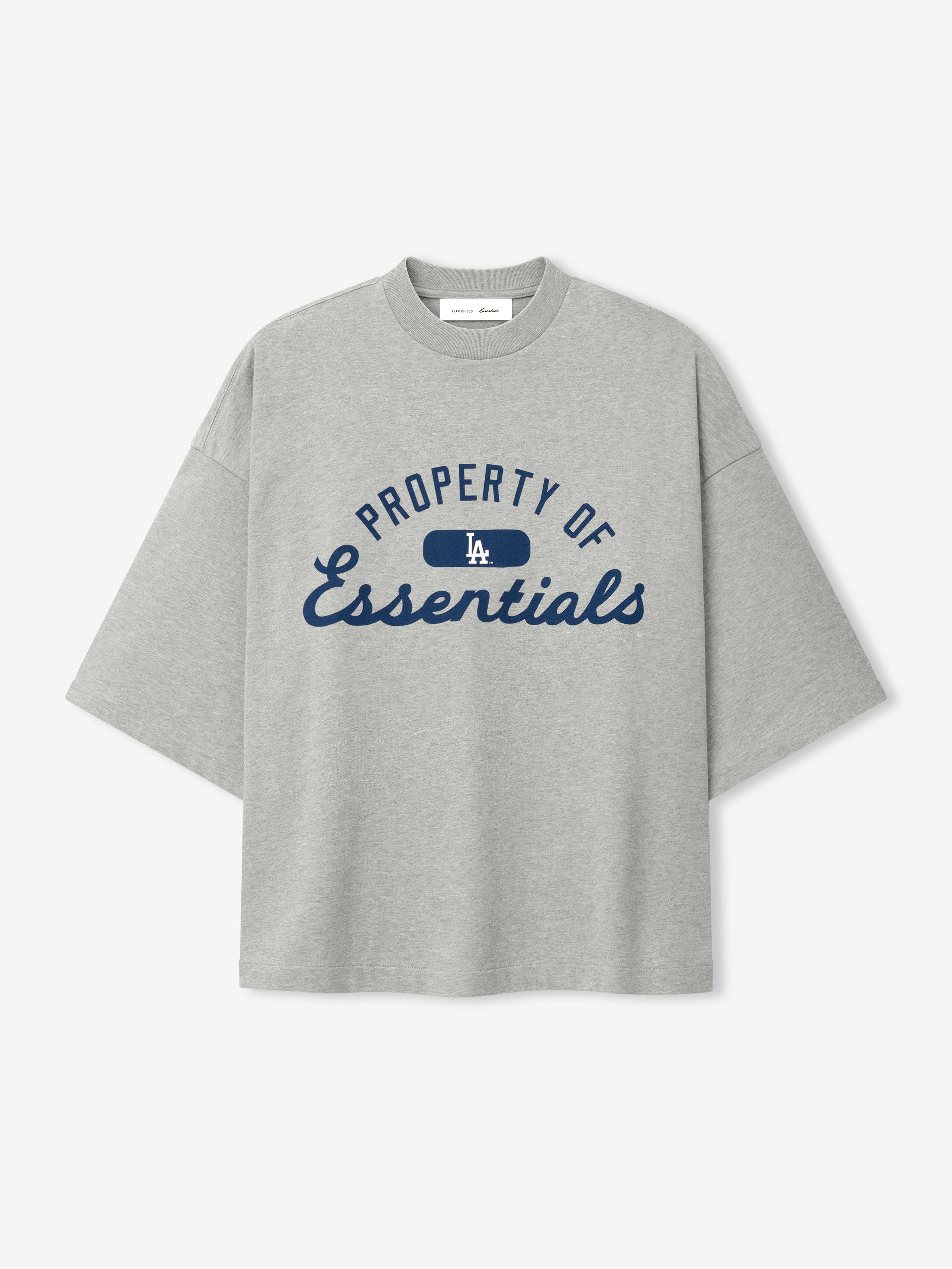 Dodgers Merch Tee in light gray heather fabric featuring navy blue "Property of Essentials" text with a small LA logo, styled as a relaxed fit short-sleeve top.
