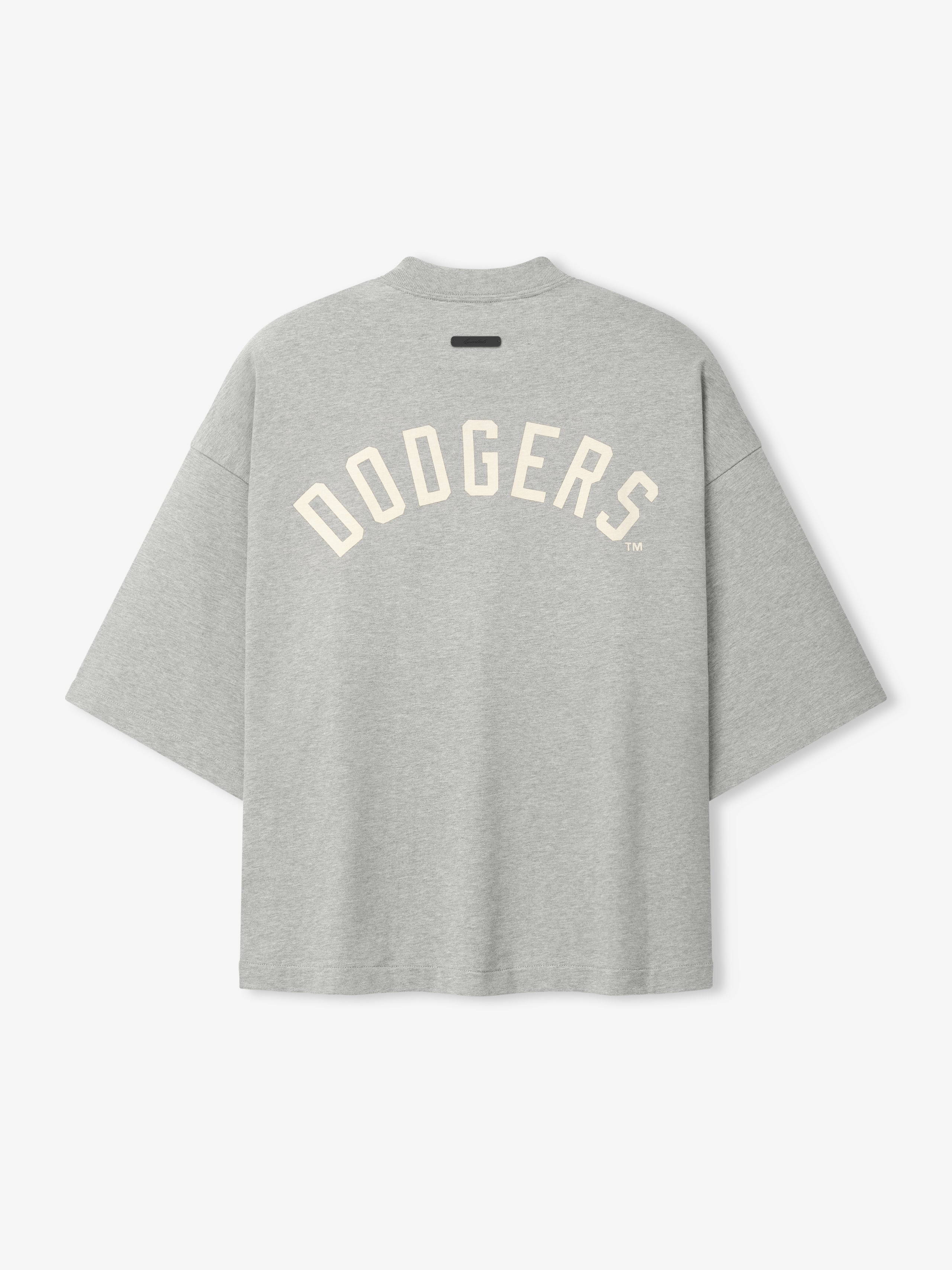 Dodgers Merch Tee in concrete heather fabric with wide short sleeves and a relaxed fit, featuring cream-colored Dodgers lettering across the back, crafted as a casual top.