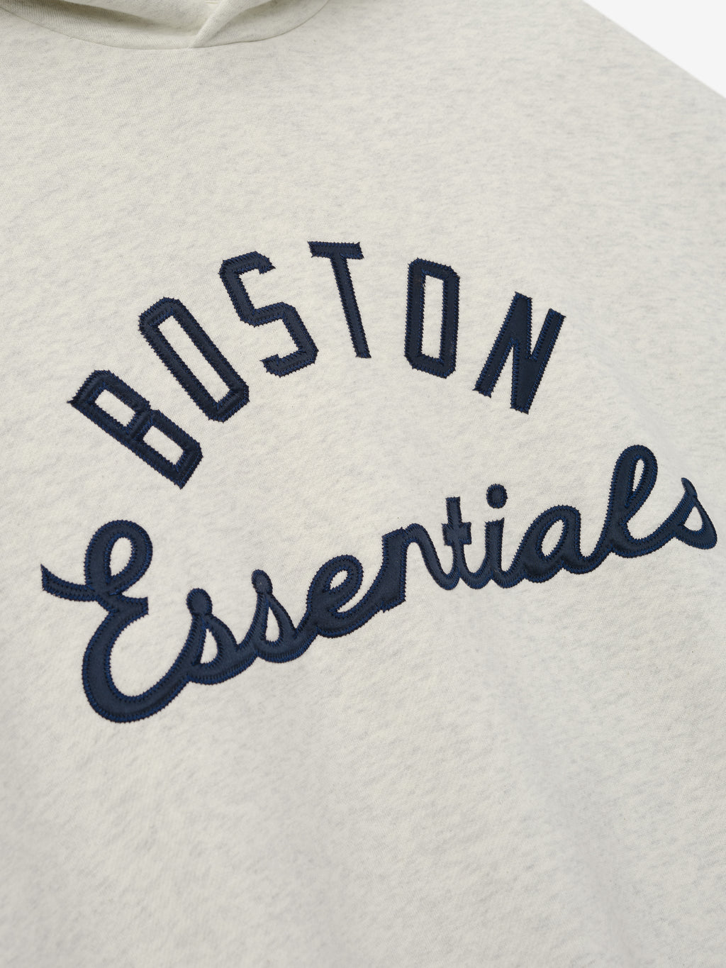 Red Sox Sport Hoodie in a light heather fabric with navy embroidered "BOSTON Essentials" text across the chest, designed as a comfortable and casual outerwear top.