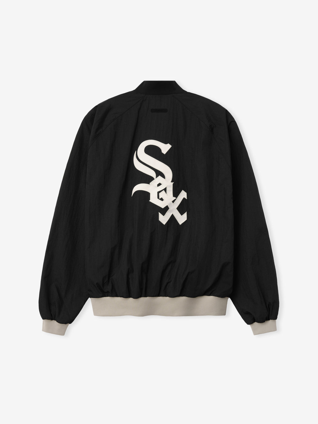 White Sox Half Zip Pullover in black featuring a large white team logo on the back, with beige ribbed cuffs and waistband for a relaxed fit outerwear top.