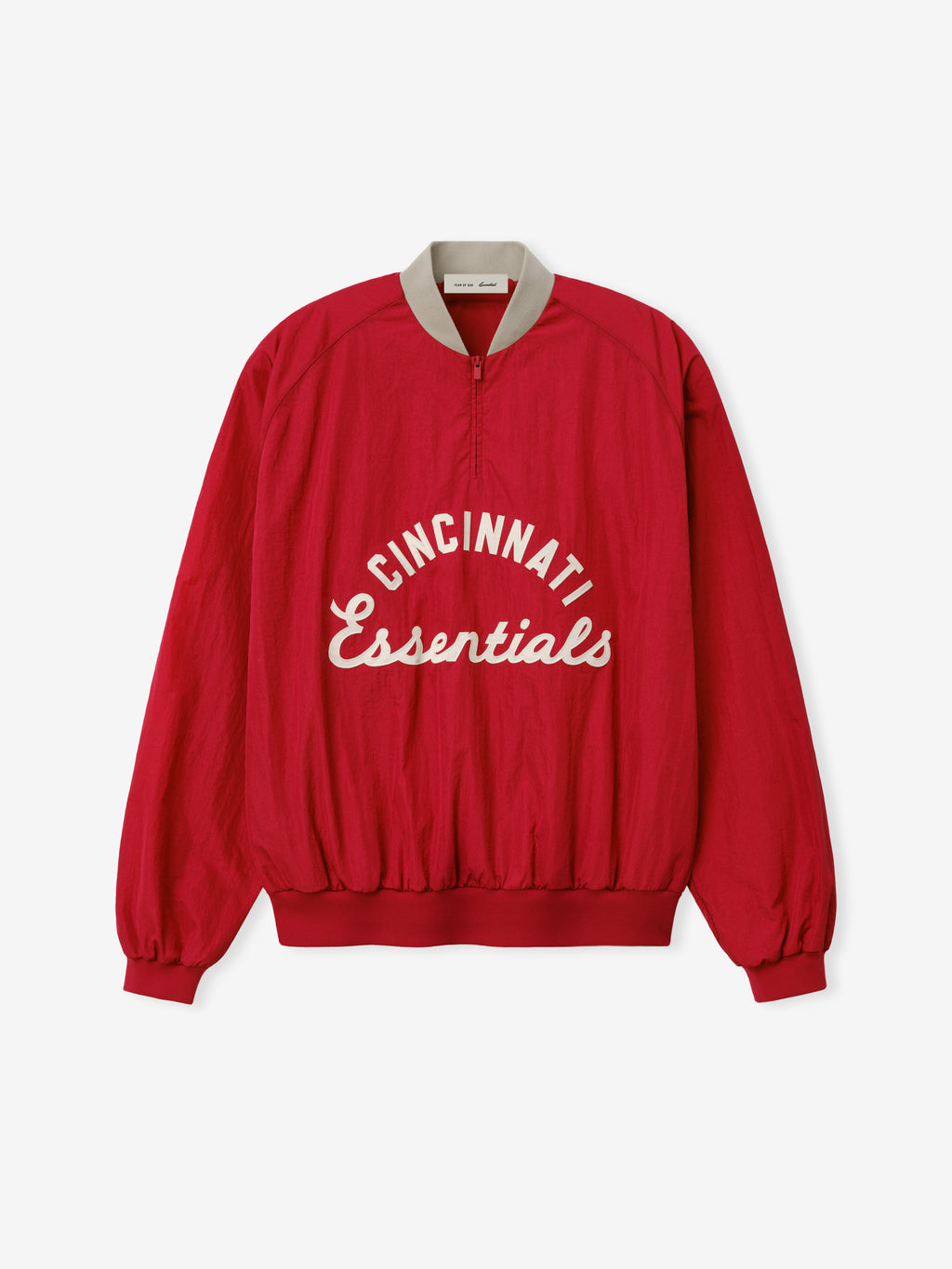 Reds Half Zip Pullover in a rich stone red shade with contrasting light collar, featuring "Cincinnati Essentials" lettering, designed as a casual, relaxed fit outerwear top.