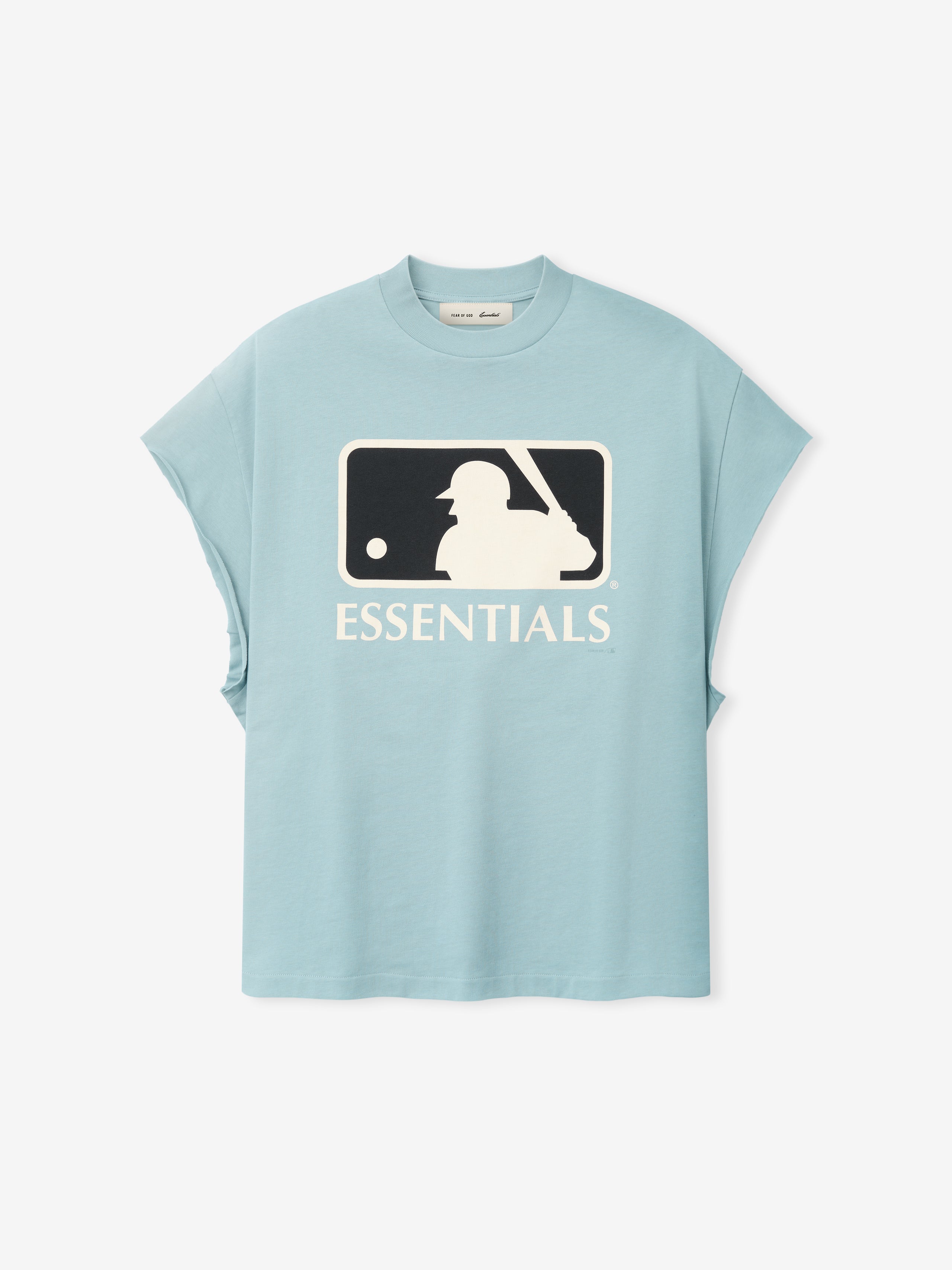 Front view of the Fear Of God X Franklin 90s Cutoff in soft stone blue featuring a vintage-style baseball batter silhouette in black and cream above bold "ESSENTIALS" text on smooth fabric.
