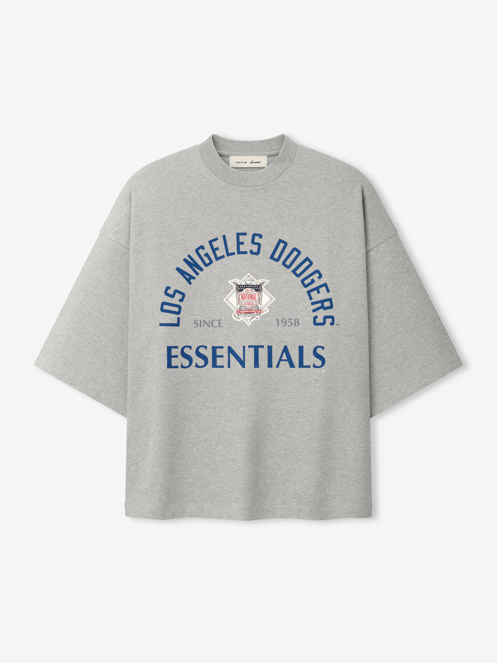 Front view of Dodgers NL Merch Tee in concrete heather gray featuring oversized fit, dropped shoulders, and navy blue "Los Angeles Dodgers Essentials" text with logo graphic on soft fabric.