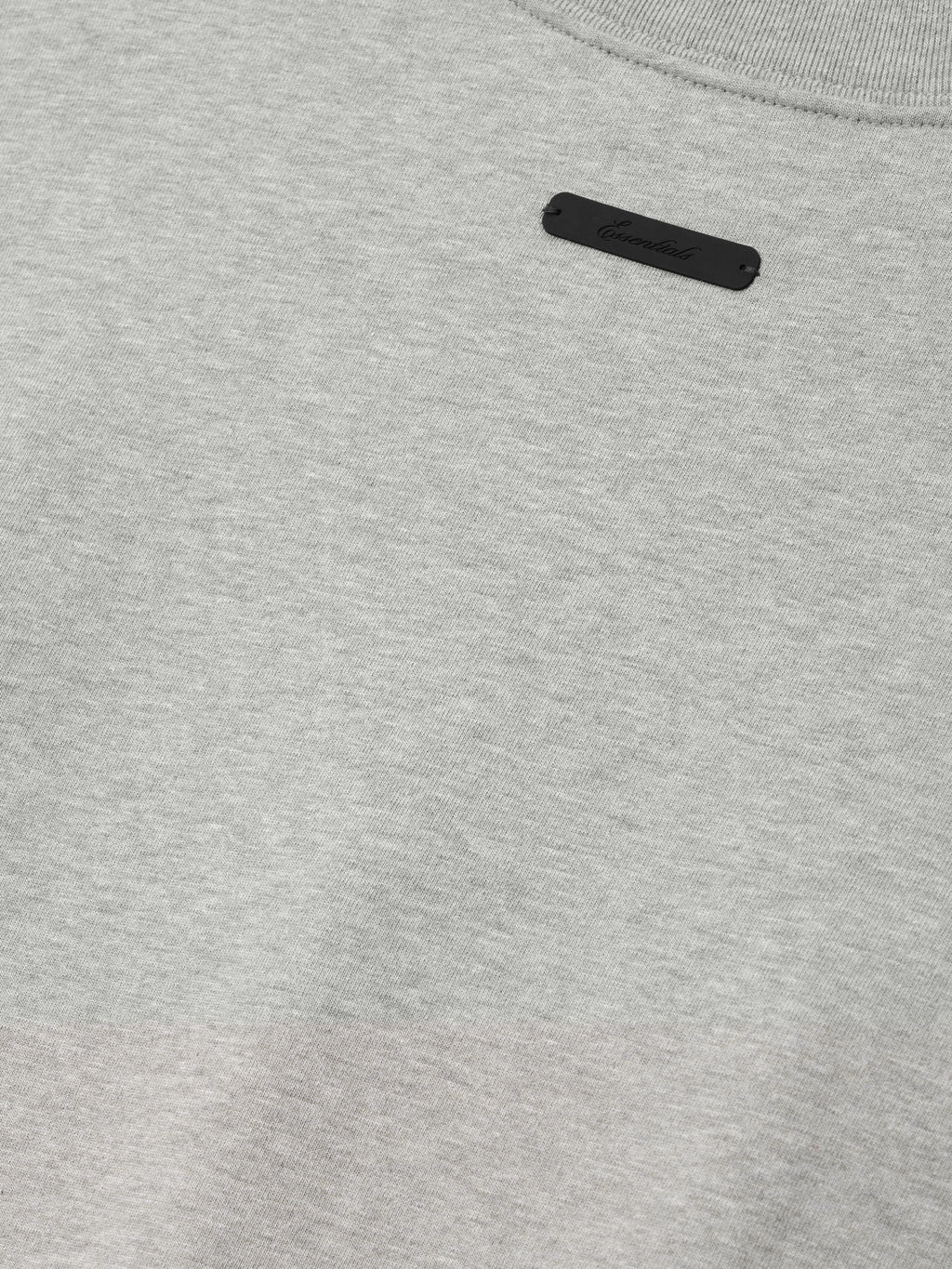 Close-up of soft concrete heather fabric from the Dodgers NL Merch Tee, highlighting a small black label near the collar on a casual top.