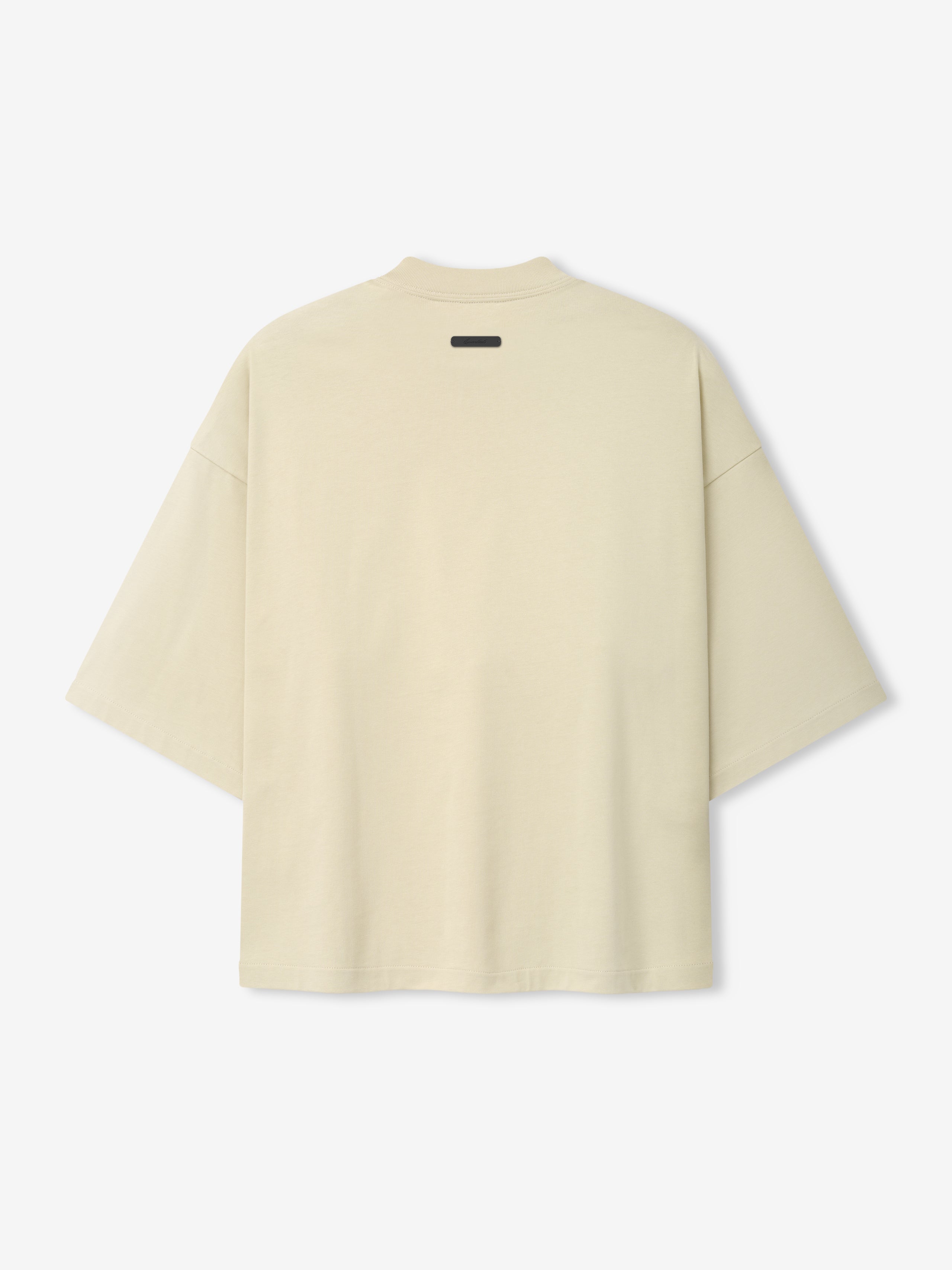 Back view of a cream-colored oversized short-sleeve top with a relaxed fit and minimalistic design, part of the Astros Al Merch Tee collection.