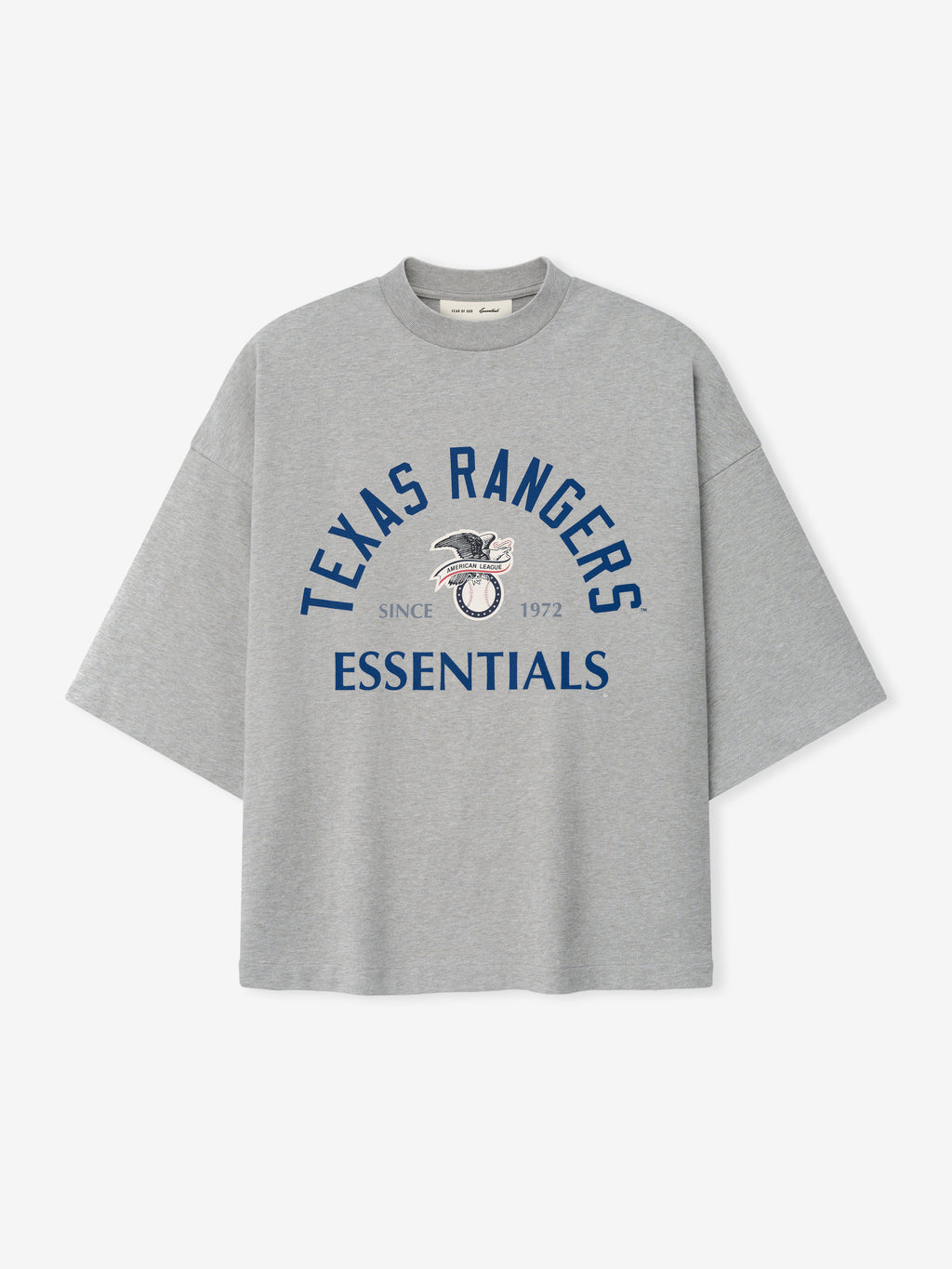 Rangers AL Merch Tee in a concrete heather gray fabric featuring oversized fit and bold blue "Texas Rangers Essentials" text with vintage logo graphic on the chest.