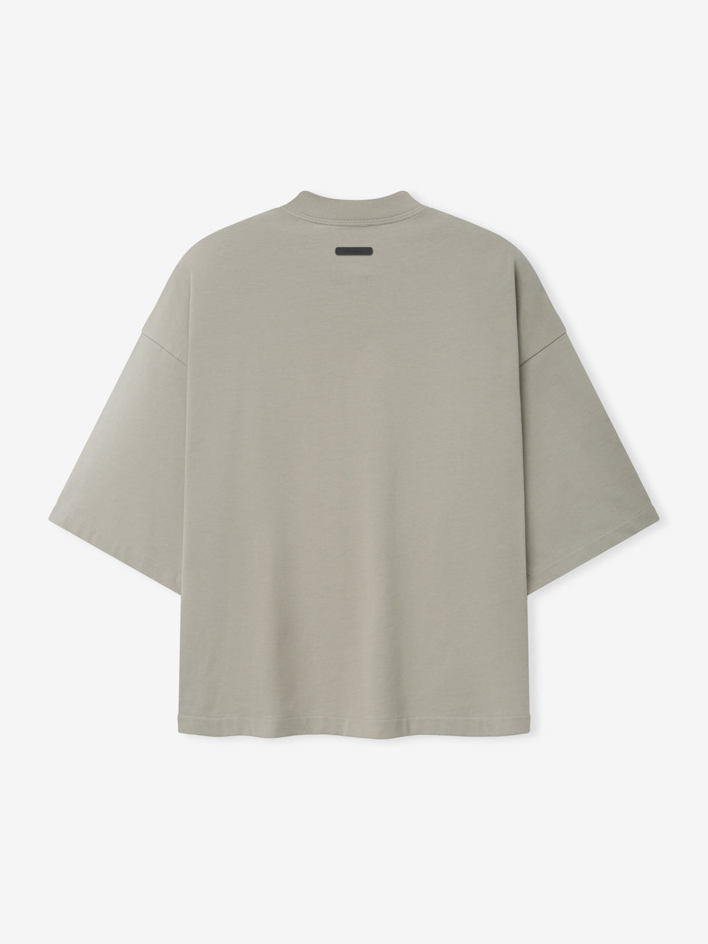 Reds NL Merch Tee in a muted gray-beige tone featuring an oversized fit with dropped shoulders and a small black label detail near the upper back on soft fabric top.