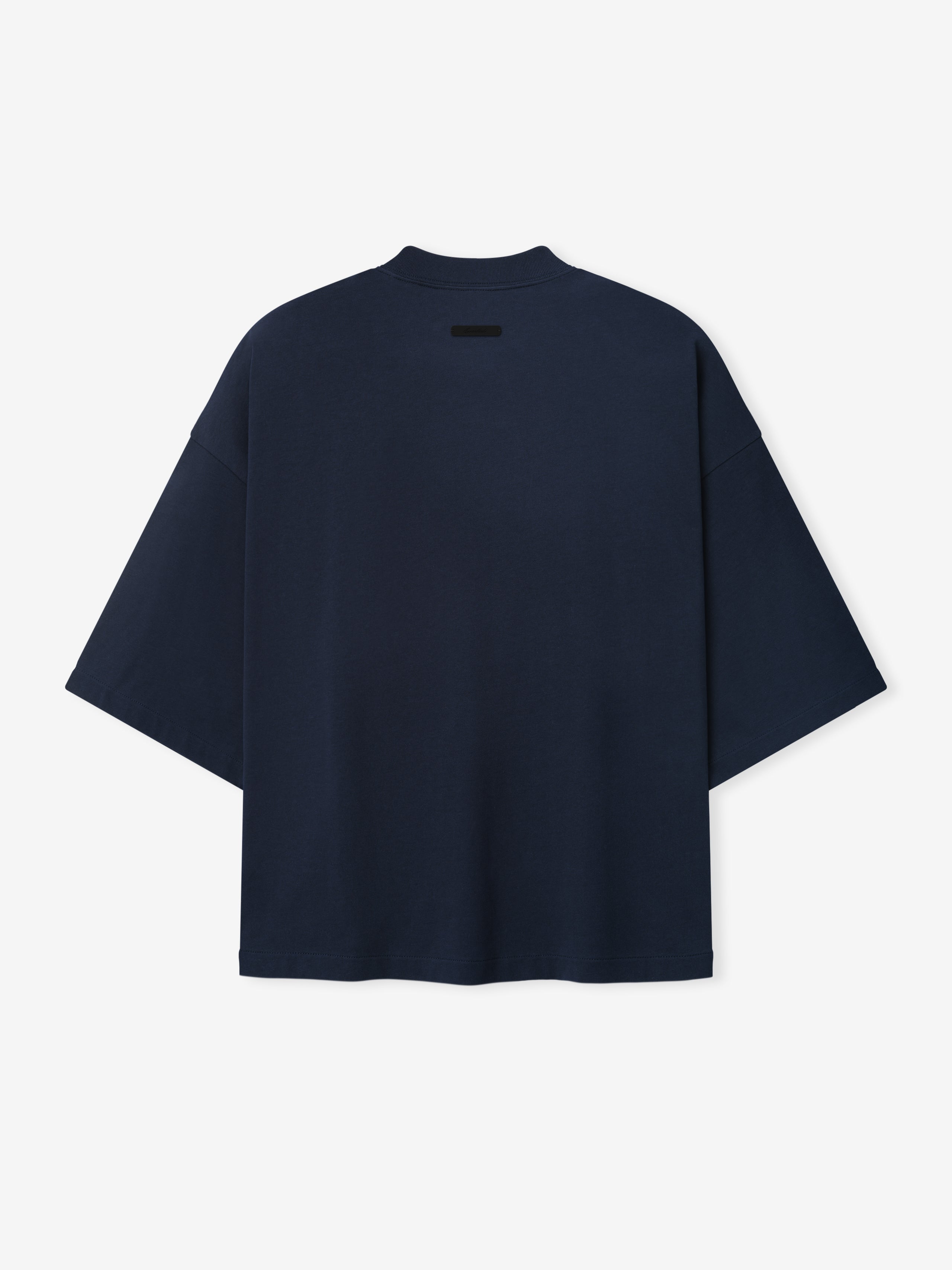 Red Sox AL Merch Tee in dark sapphire featuring an oversized fit with dropped shoulders and a small black label detail near the neckline on soft fabric.