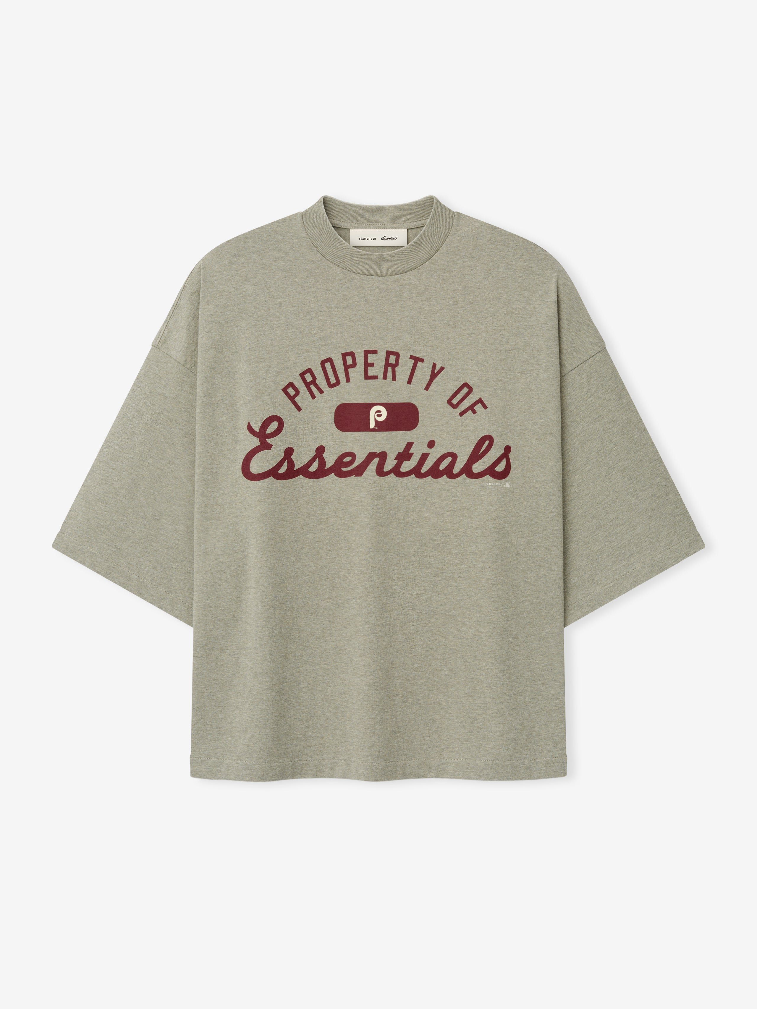 Phillies Merch Tee in a muted gray-green shade featuring maroon "Property of Essentials" text and logo across the chest, designed as a relaxed-fit casual top.