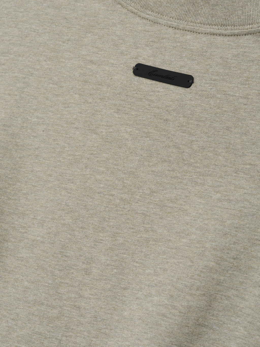 Phillies NL Merch Tee in a soft seal heather fabric featuring a small black branded patch near the neckline, designed as a comfortable and stylish casual top.