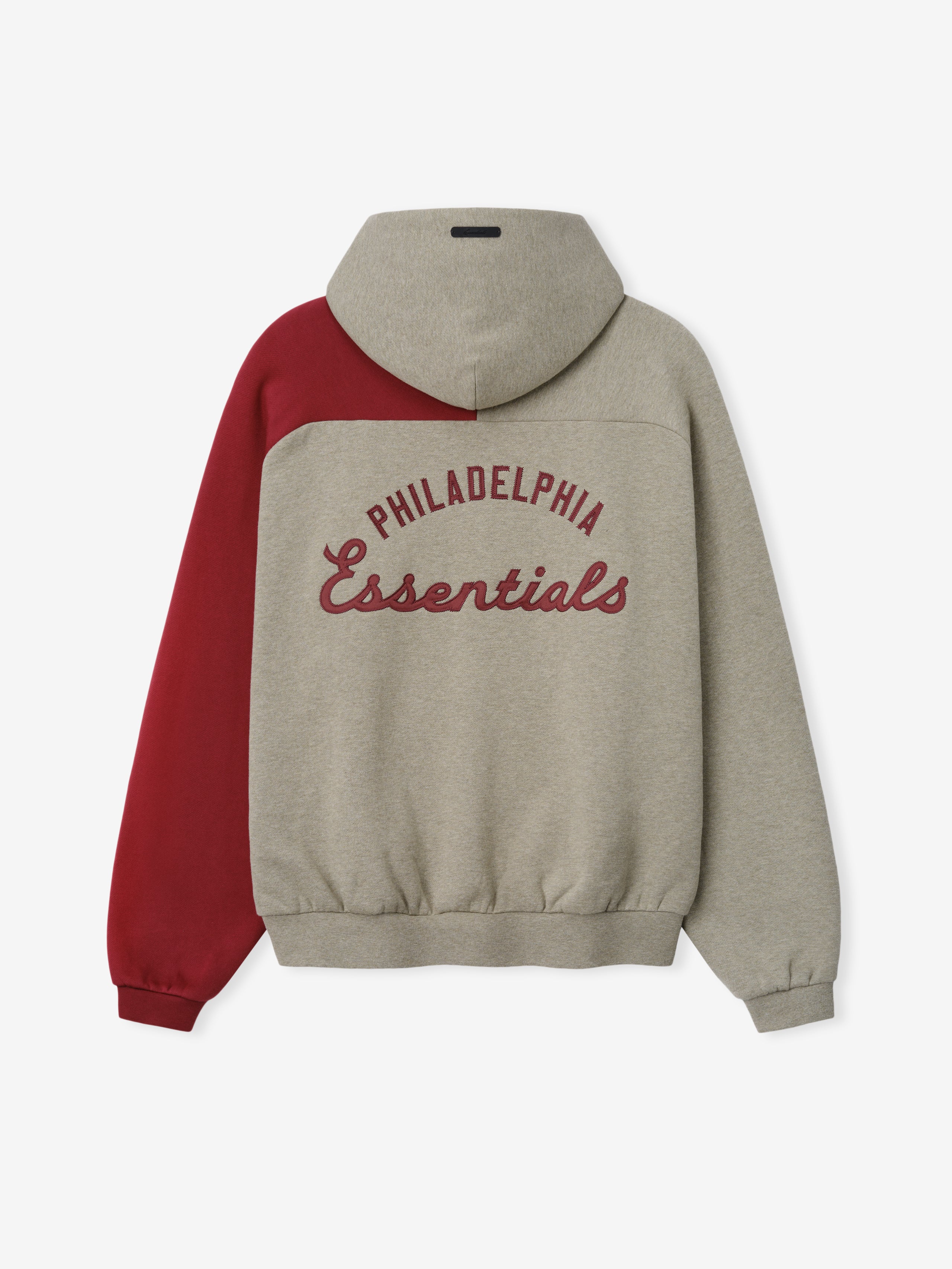 Phillies Raglan Half Zip Sport Hoodie in a two-tone design with a muted gray body, contrasting deep red left sleeve, and maroon "Philadelphia Essentials" script across the back.