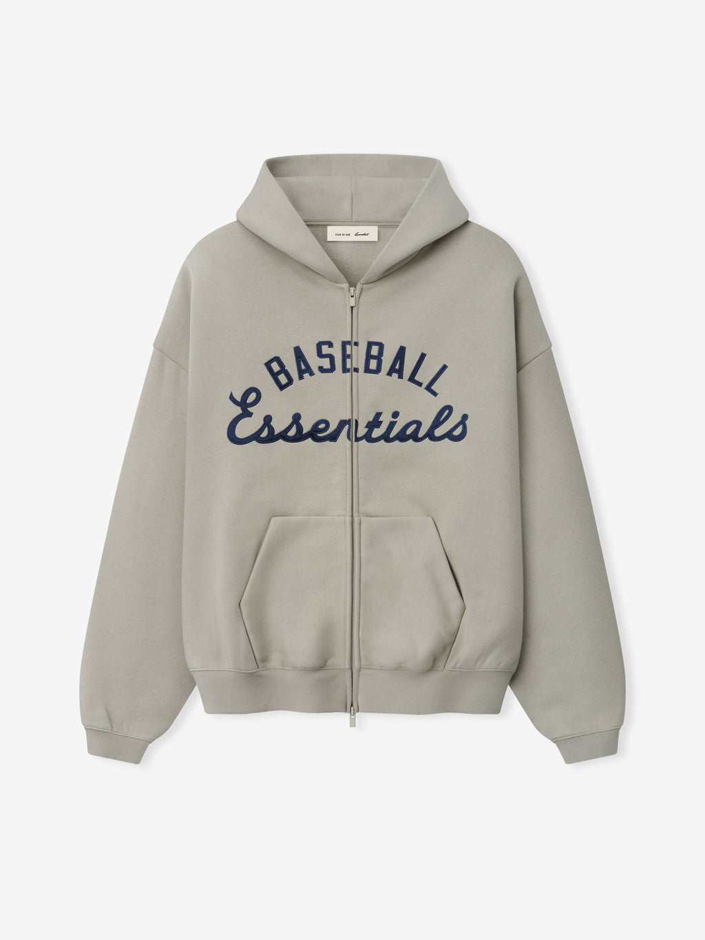 Mlb Full Zip Sport Hoodie in muted beige with full front zipper, hood, and navy "Baseball Essentials" text across the chest, featuring ribbed cuffs and front kangaroo pockets.
