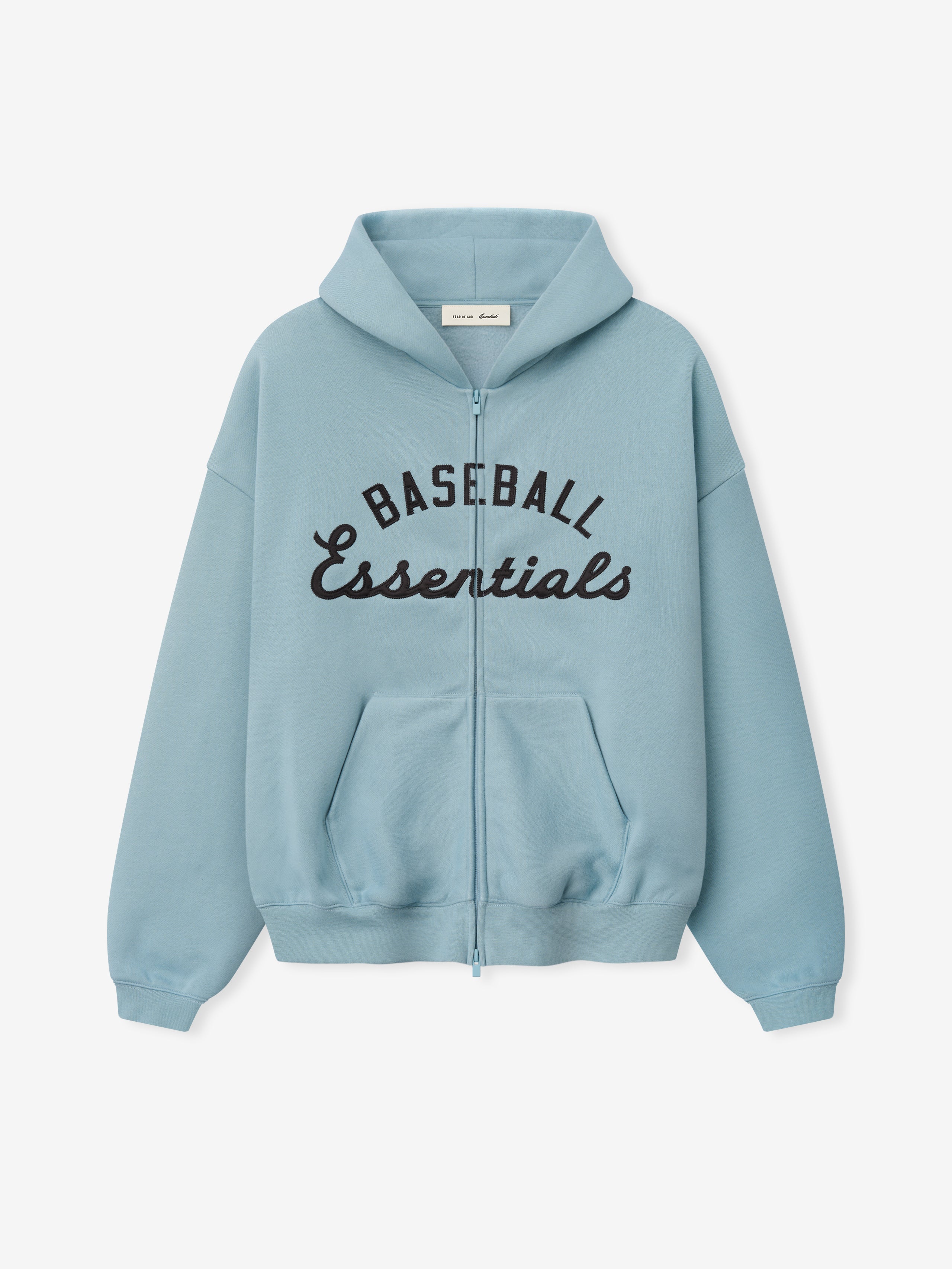 Mlb Full Zip Sport Hoodie in soft stone blue featuring a full front zipper, front kangaroo pockets, and bold black "Baseball Essentials" text across the chest in a casual fit.