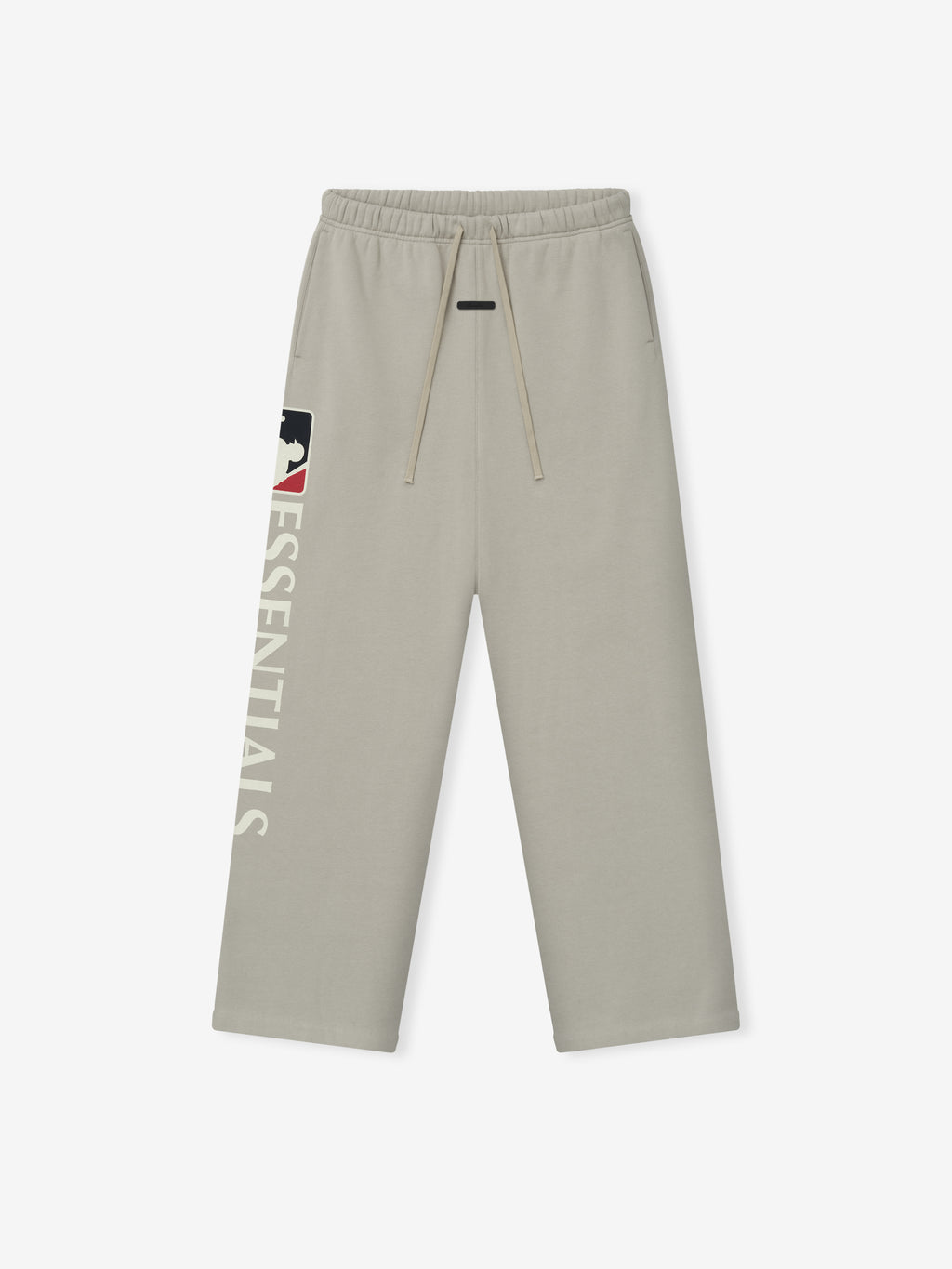 Light beige Mlb Lounge Sweatpant with a relaxed fit, featuring an elastic waistband with drawstrings and bold "ESSENTIALS" text alongside a logo graphic on the left leg.