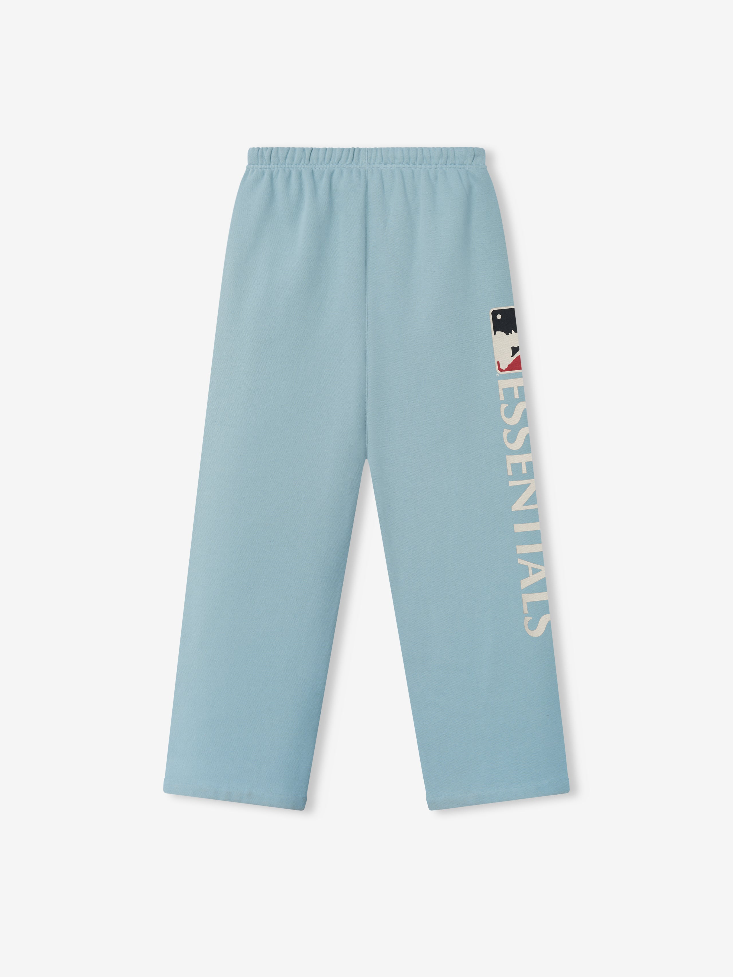 Mlb Lounge Sweatpant in soft stone blue featuring a straight-leg design with an elastic waistband and bold vertical "ESSENTIALS" text alongside a contrasting logo on the side leg.