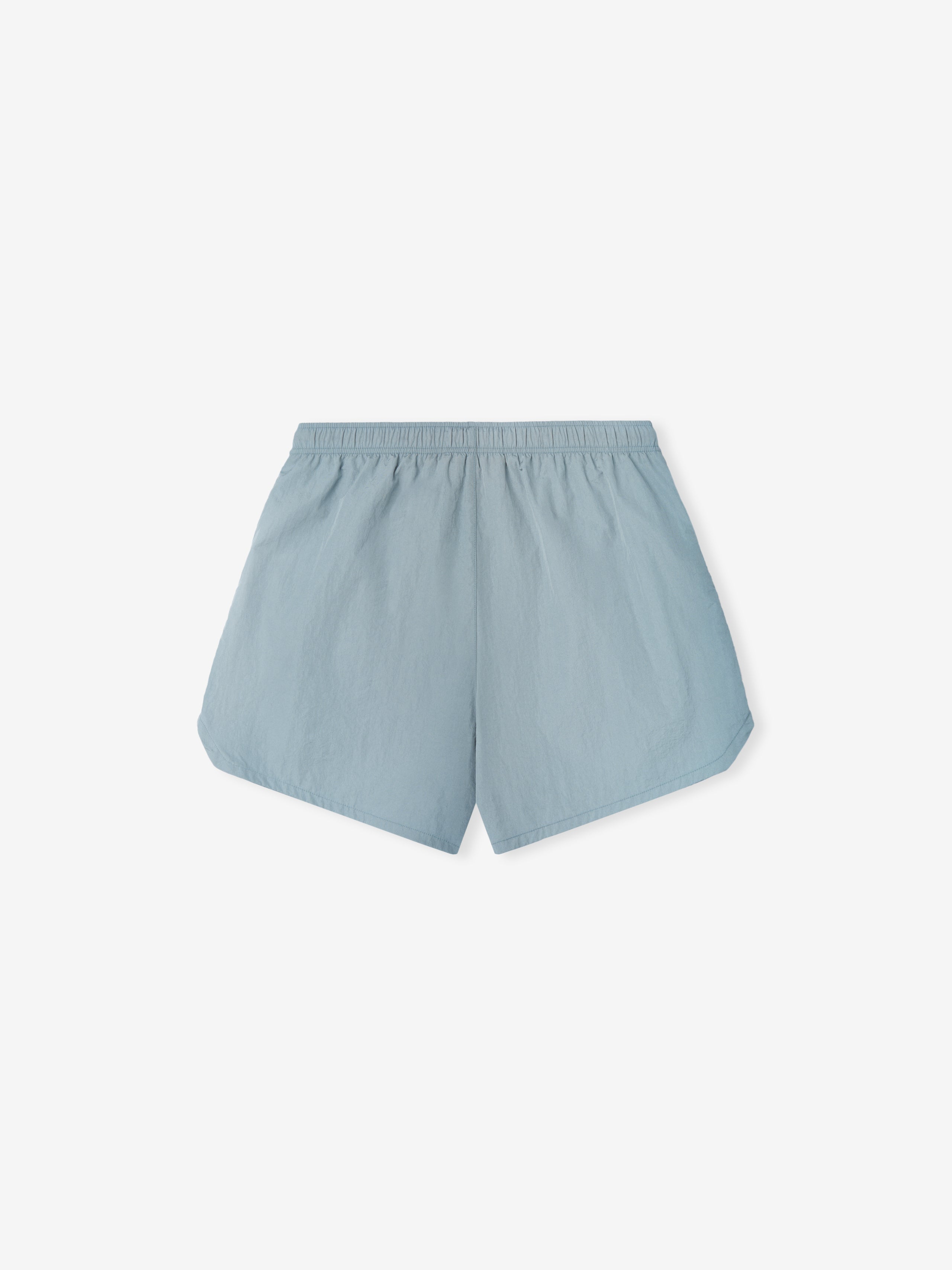 Mlb Gym Short in soft stone blue featuring a lightweight fabric with an elastic waistband, designed for comfortable casual athletic bottoms.