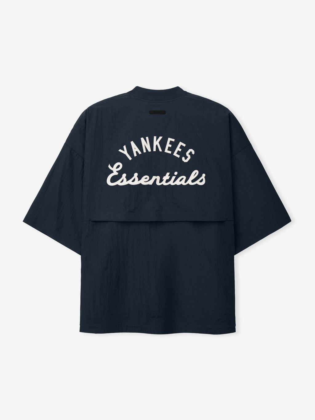 Yankees 3/4 Sleeve Pullover in dark navy showcasing a loose fit with dropped shoulders and large "Yankees Essentials" text printed across the upper back on lightweight fabric top.