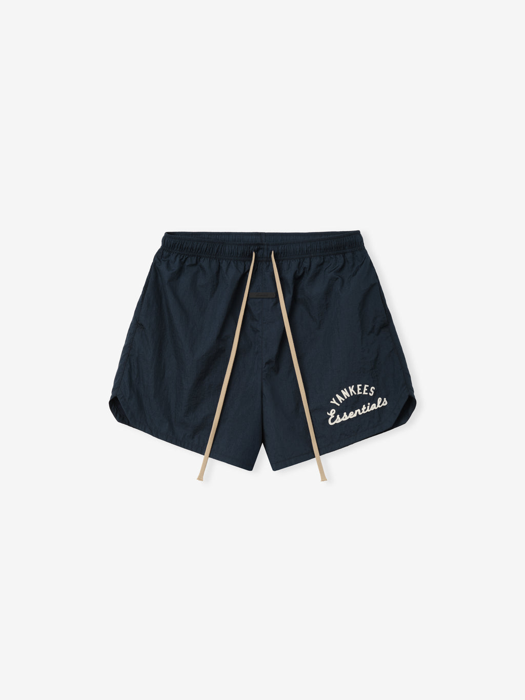 Yankees Gym Short in dark sapphire featuring a lightweight fabric with an elastic waistband and beige drawstrings, styled with curved hems and white script embroidery on the leg.