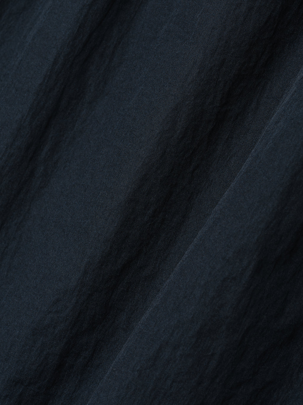 Yankees Gym Short fabric detail in dark sapphire, showcasing a lightweight textured material with a subtle sheen for breathable, comfortable bottoms.