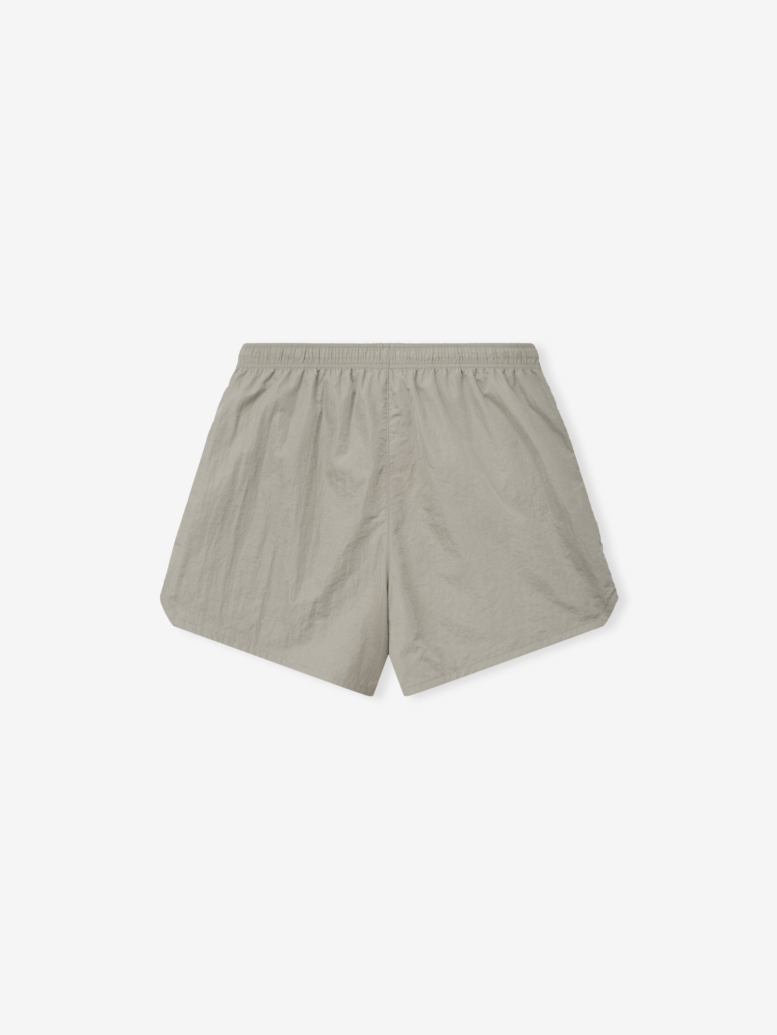 Back view of Dodgers Gym Short in muted taupe featuring a lightweight fabric and an elastic waistband designed for comfort and ease of movement.