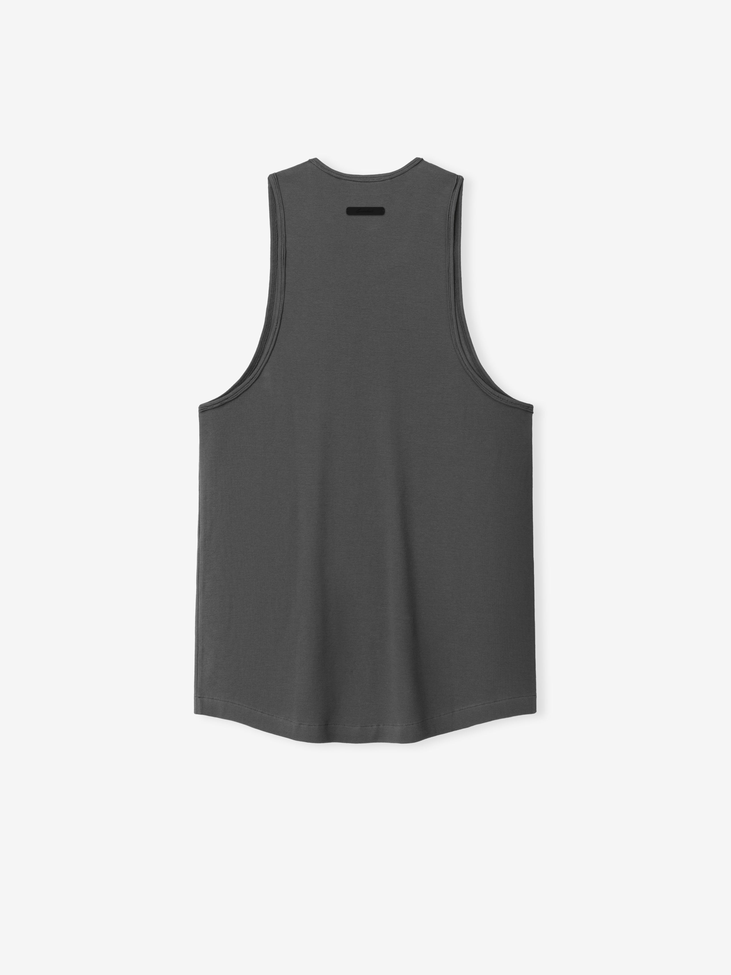 Ribbed Essential Tank in a deep iron grey shade, featuring a smooth knit fabric with wide armholes and a relaxed fit for a comfortable casual tops option.