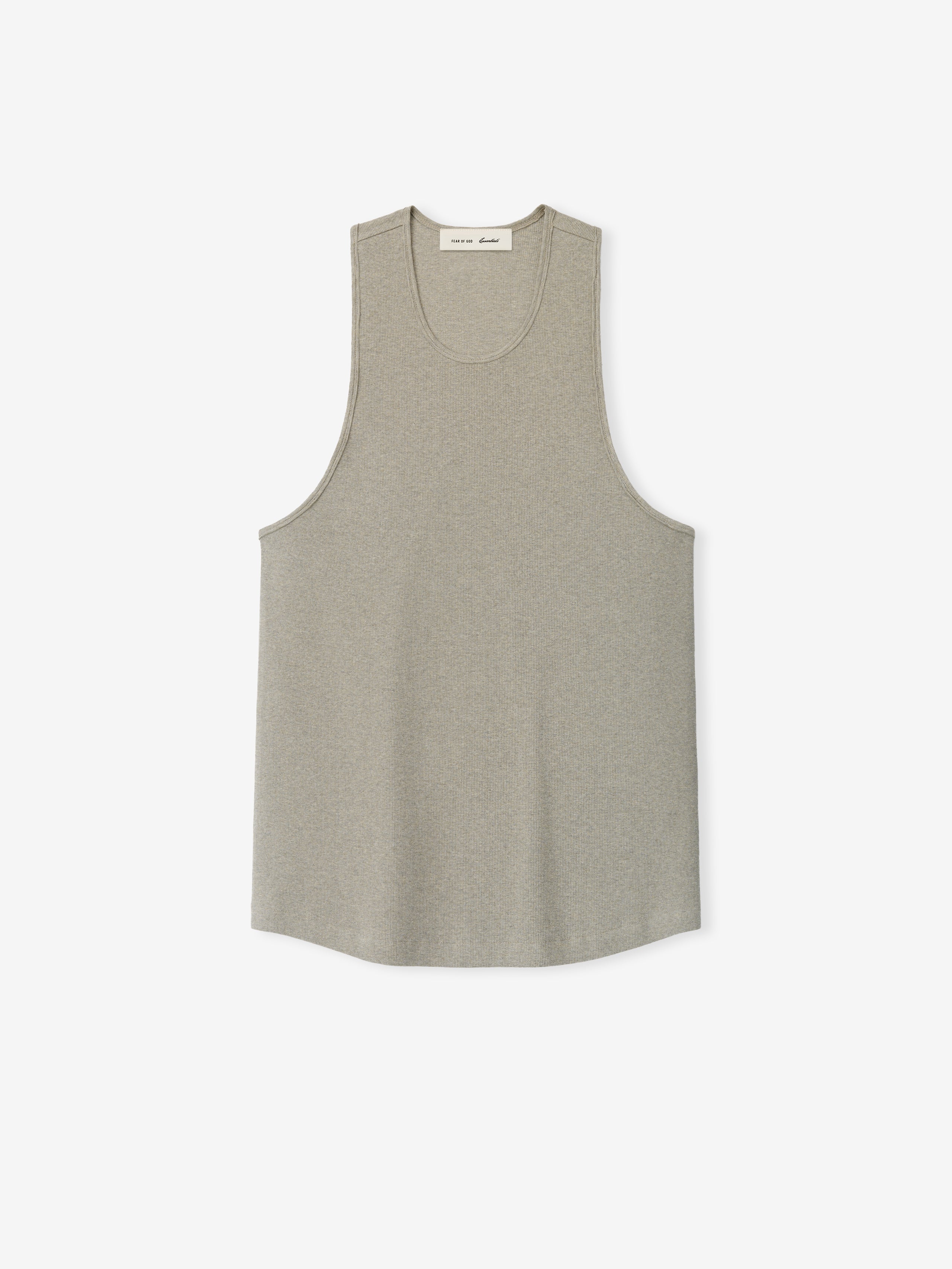 Ribbed Essential Tank in a soft muted beige tone with a finely ribbed knit texture, featuring a relaxed fit and classic sleeveless cut for versatile casual layering.