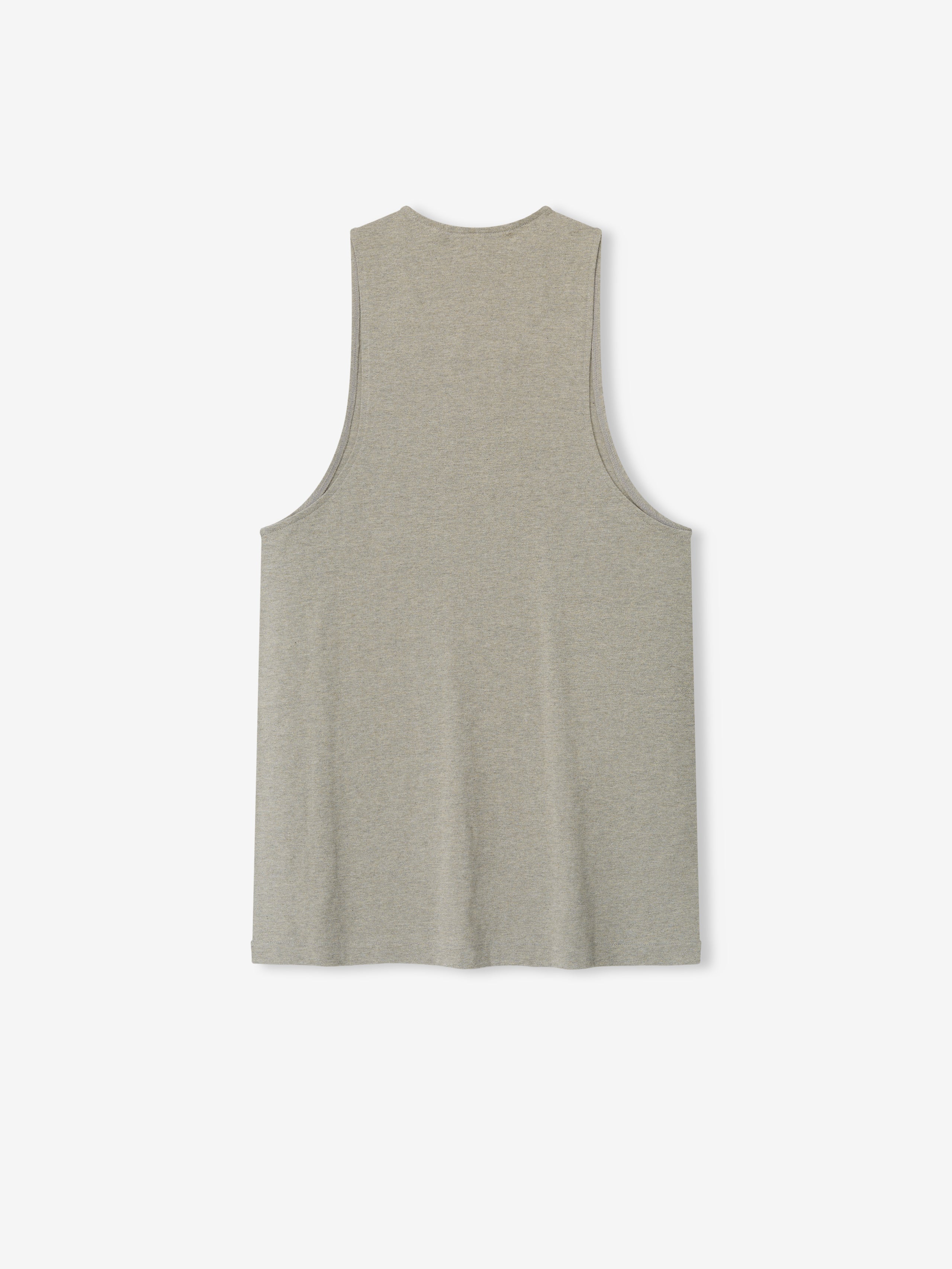 Essential Tank in a soft muted taupe hue with a sleeveless cut and wide armholes, designed for a relaxed fit and comfortable casual layering top.