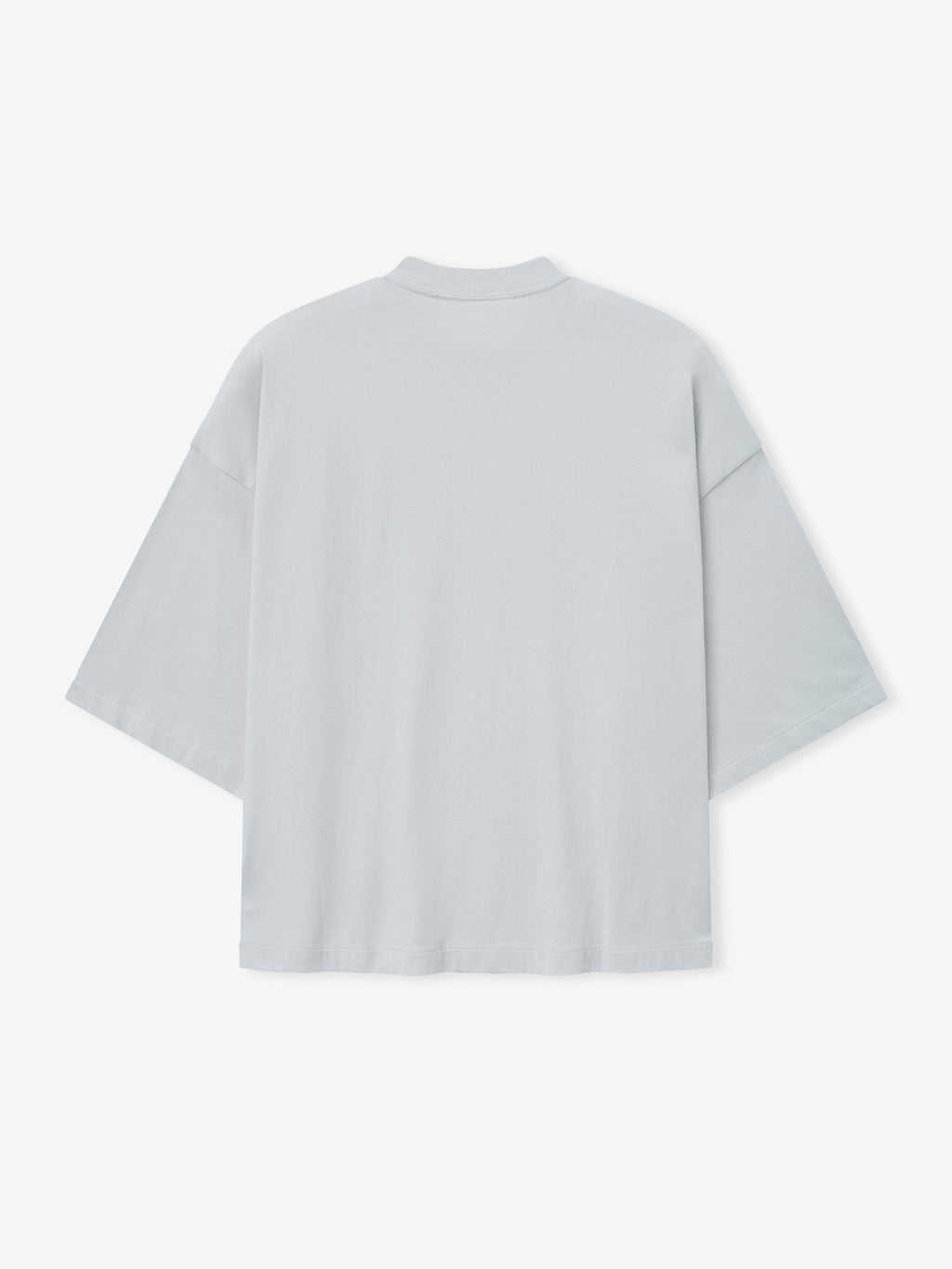 Merch Tee (Boxy) in light overcast grey featuring a loose boxy cut with dropped shoulders, short sleeves, and a smooth back for a modern minimalist casual top.