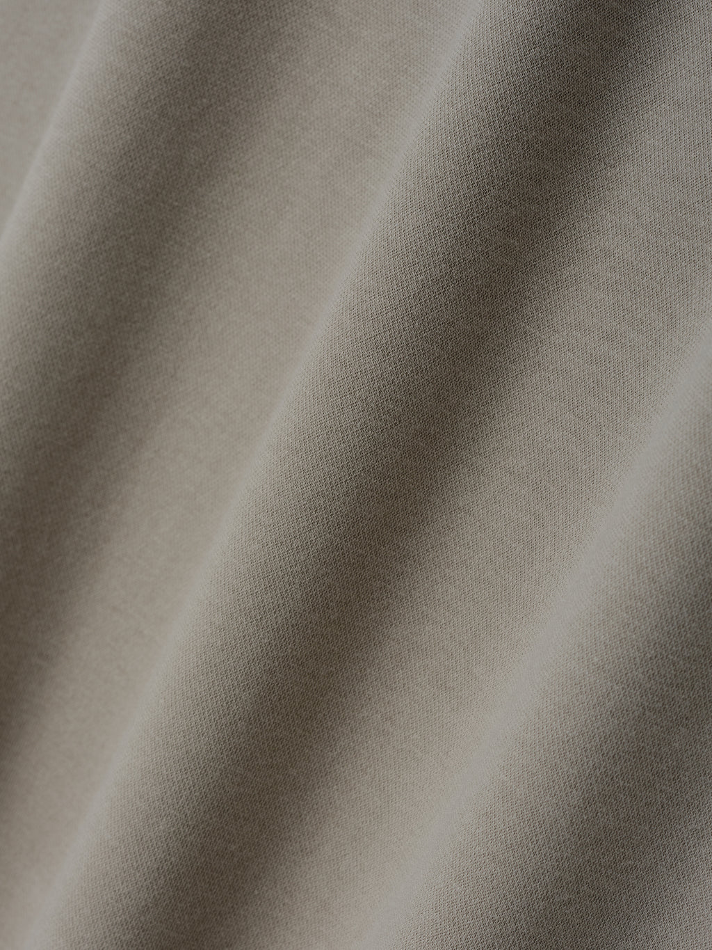 Ponte Modern Tee (Relaxed) fabric in a soft seal tone with a smooth, fine knit texture, ideal for a comfortable and versatile casual top.