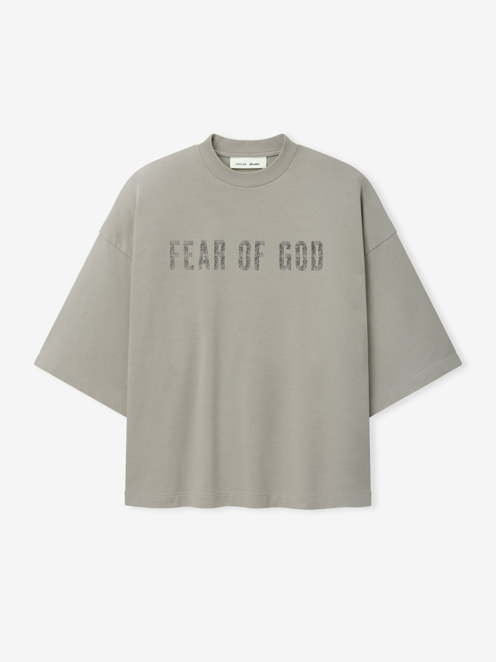 Merch Tee (Boxy) in muted grey with an oversized fit and dropped shoulders, featuring distressed Fear of God lettering across the chest for a modern streetwear-inspired top.