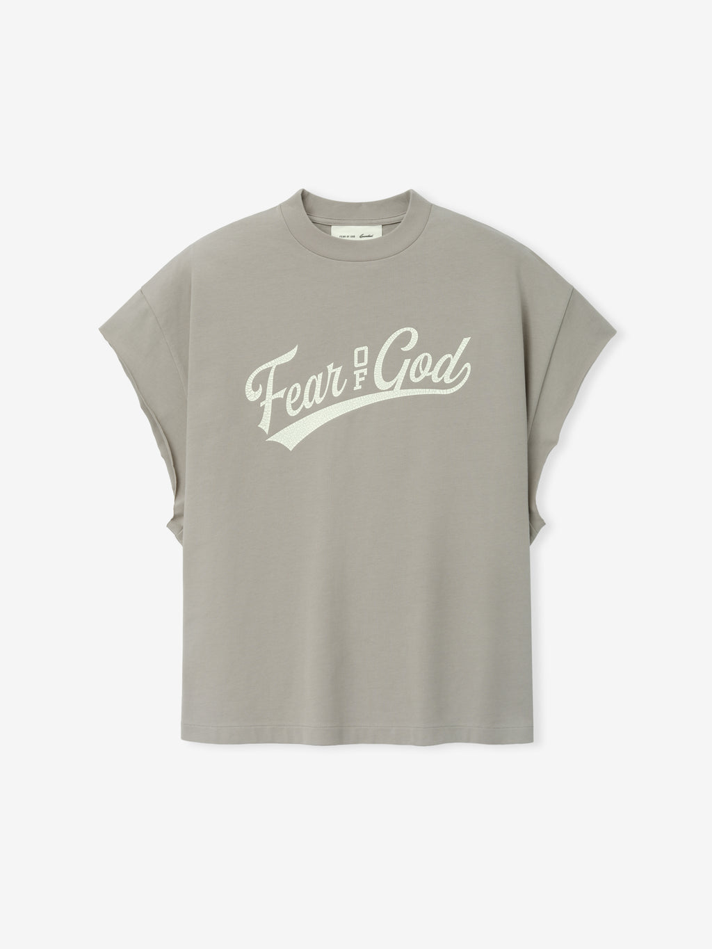 Cut Off 90'S Tee in a muted taupe shade featuring a vintage-style off-white Fear of God script across the chest with dropped, cuffed short sleeves for a laid-back streetwear look.