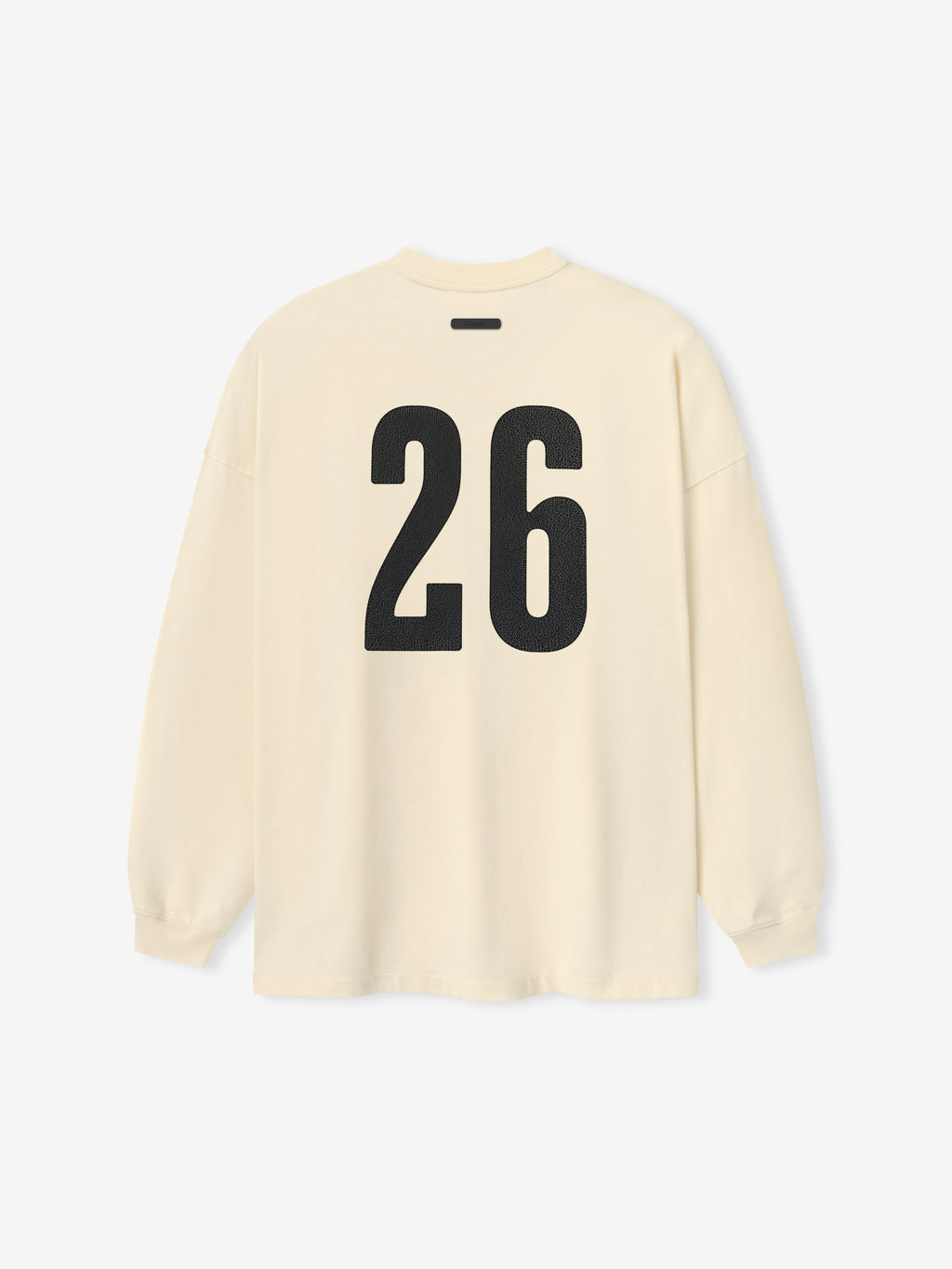 Merch Long Sleeve Tee in a soft off-white shade featuring long sleeves, a relaxed fit, and a bold black number "26" printed on the back for a sporty, casual look.