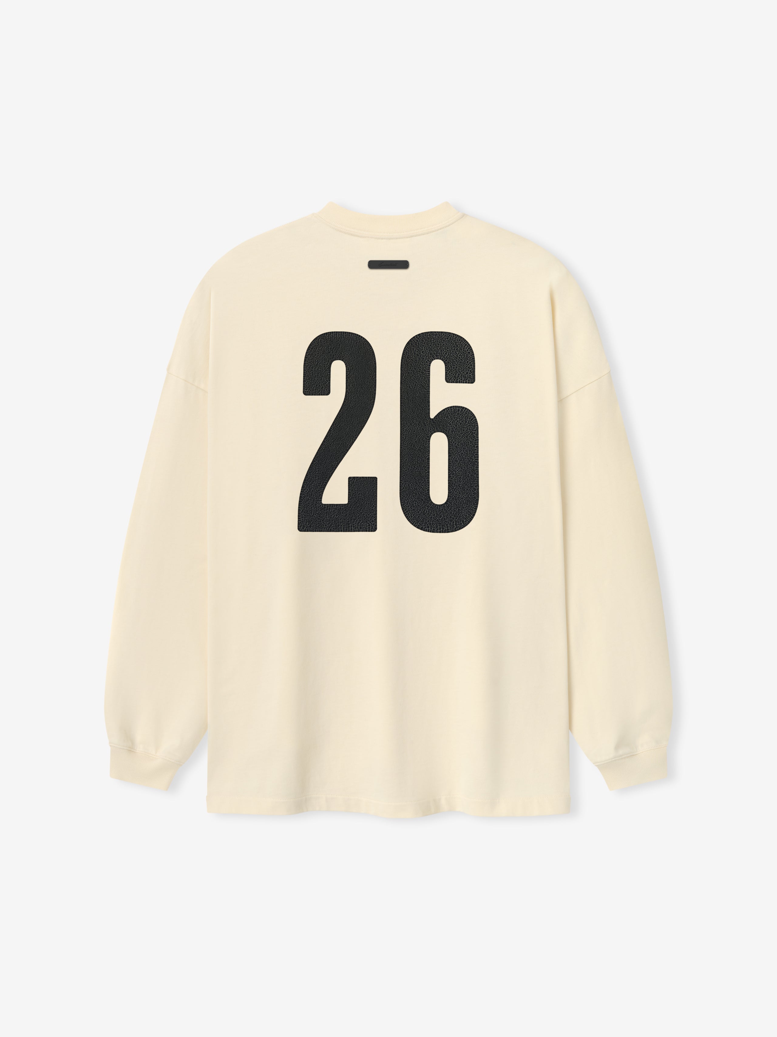 Merch Long Sleeve Tee in a soft off-white shade featuring long sleeves, a relaxed fit, and a bold black number "26" printed on the back for a sporty, casual look.