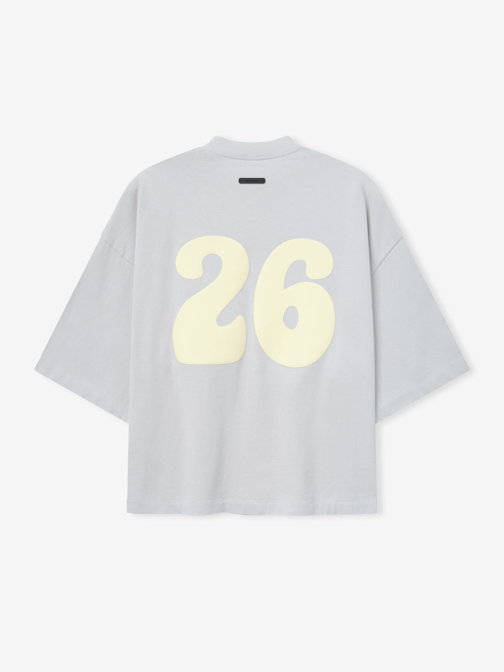 Heavy Jersey Merch Tee in a soft washed light grey with an oversized fit and dropped shoulders, featuring a large cream-colored number 26 printed on the back for a vintage sporty look.