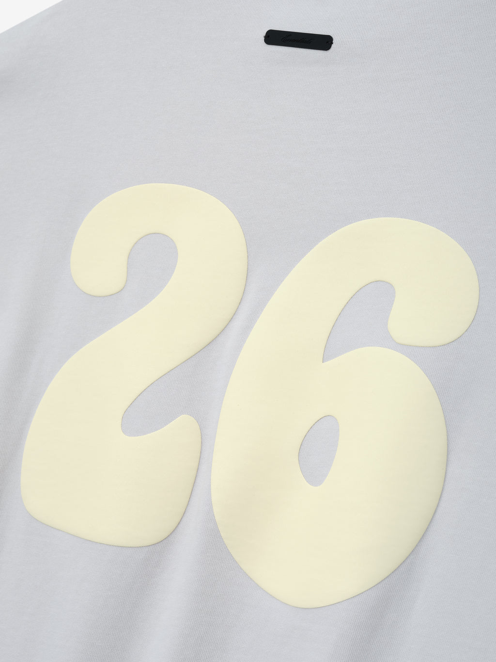 Heavy Jersey Merch Tee in a soft washed overcast shade featuring a large cream-colored number 26 printed on the back for a vintage-inspired casual top with a subtle textured finish.