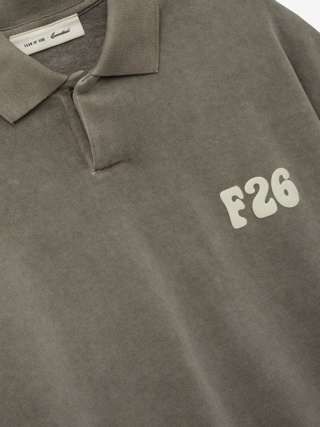 Heavy Jersey Cropped Polo in a muted washed seal shade, featuring a classic collar and short sleeves with a bold F26 logo printed on the chest for a distinctive casual top.